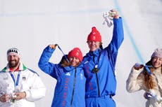 GB’s Charlotte Bankes and Huw Nightingale make history with stunning Olympic gold in mixed snowboard cross