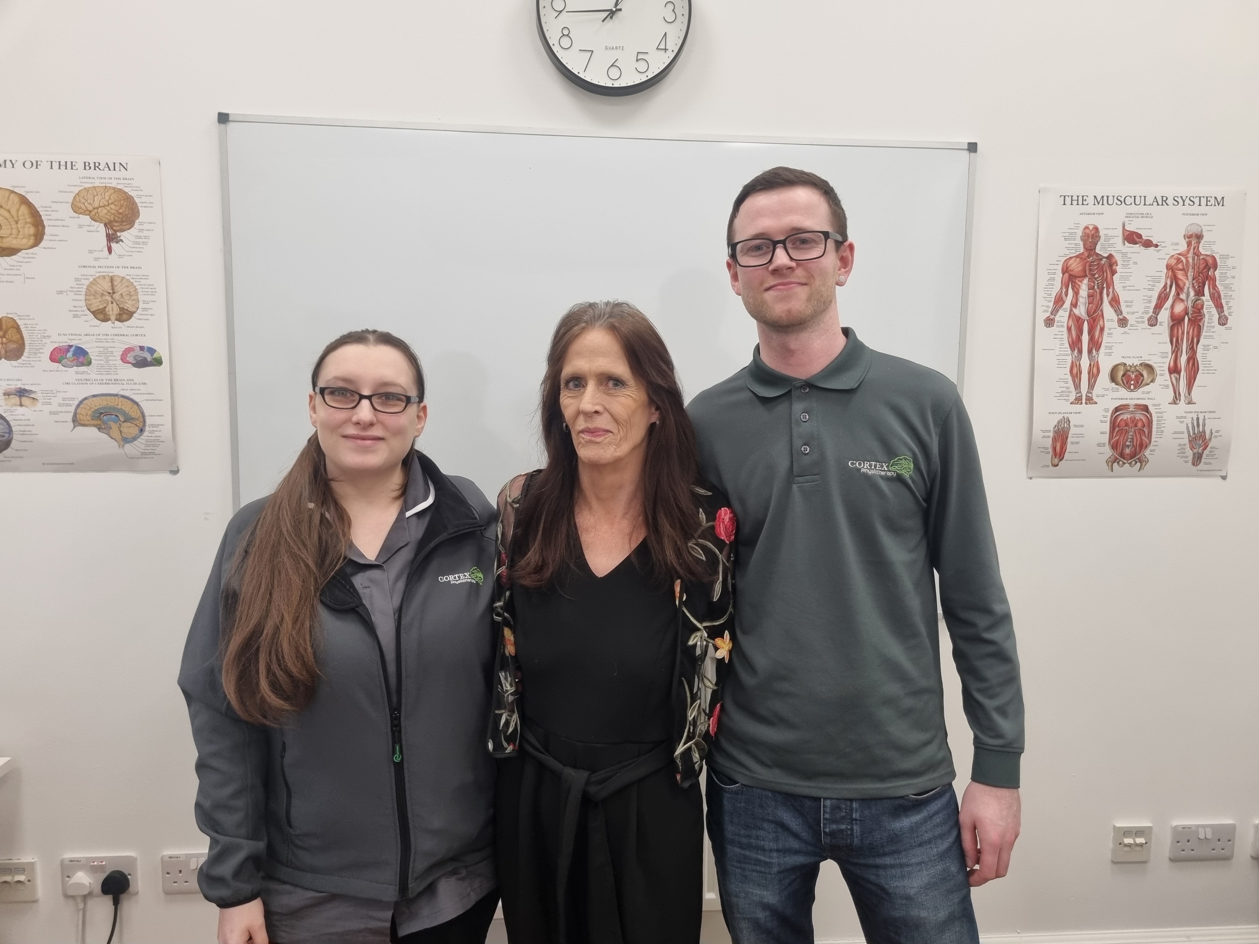 Dionne Harvey, co-founder of Cortex Physiotherapy, Karen Kerr and Iain Legge, fellow co-founder of the practise and Ms Kerr's son at Cortex Physiotherapy in Kilmarnock