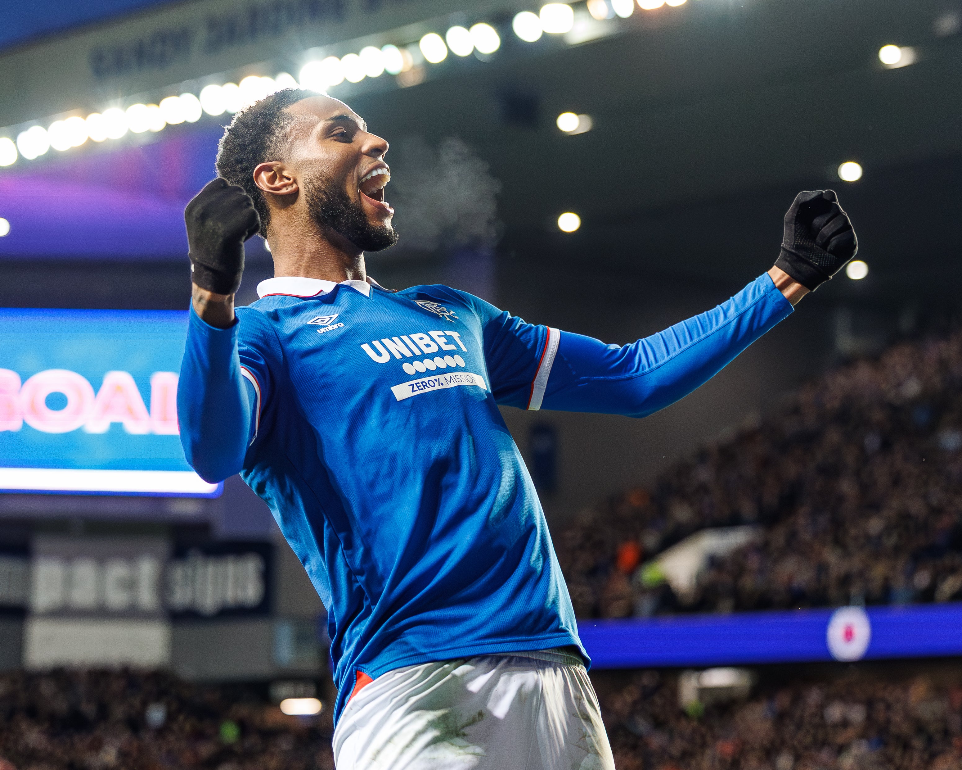 Youssef Chermiti celebrates his hat-trick after cutting Hearts' lead down to two points