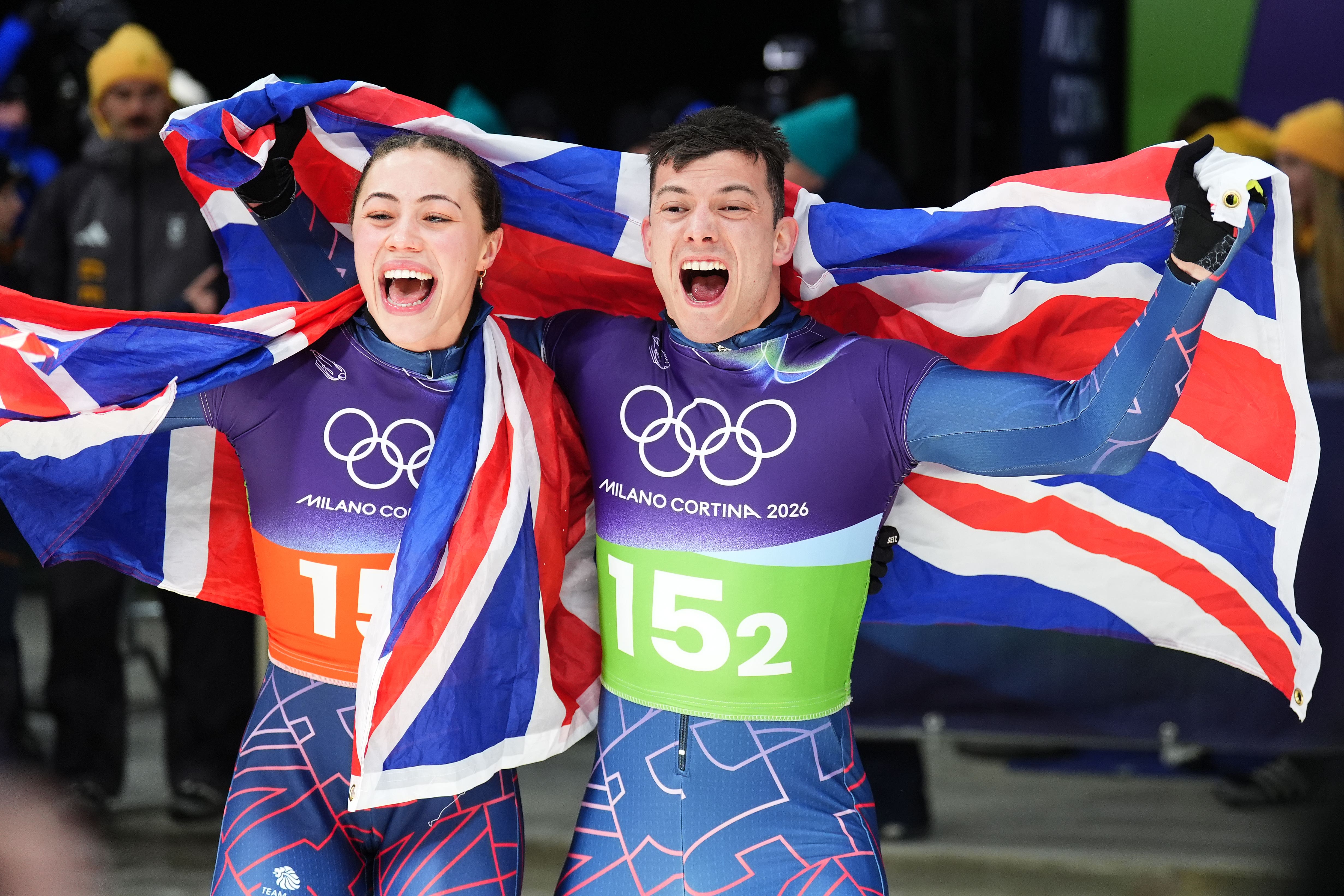Tabby Stoecker and Matt Weston celebrate their gold medal (Andrew Milligan/PA).