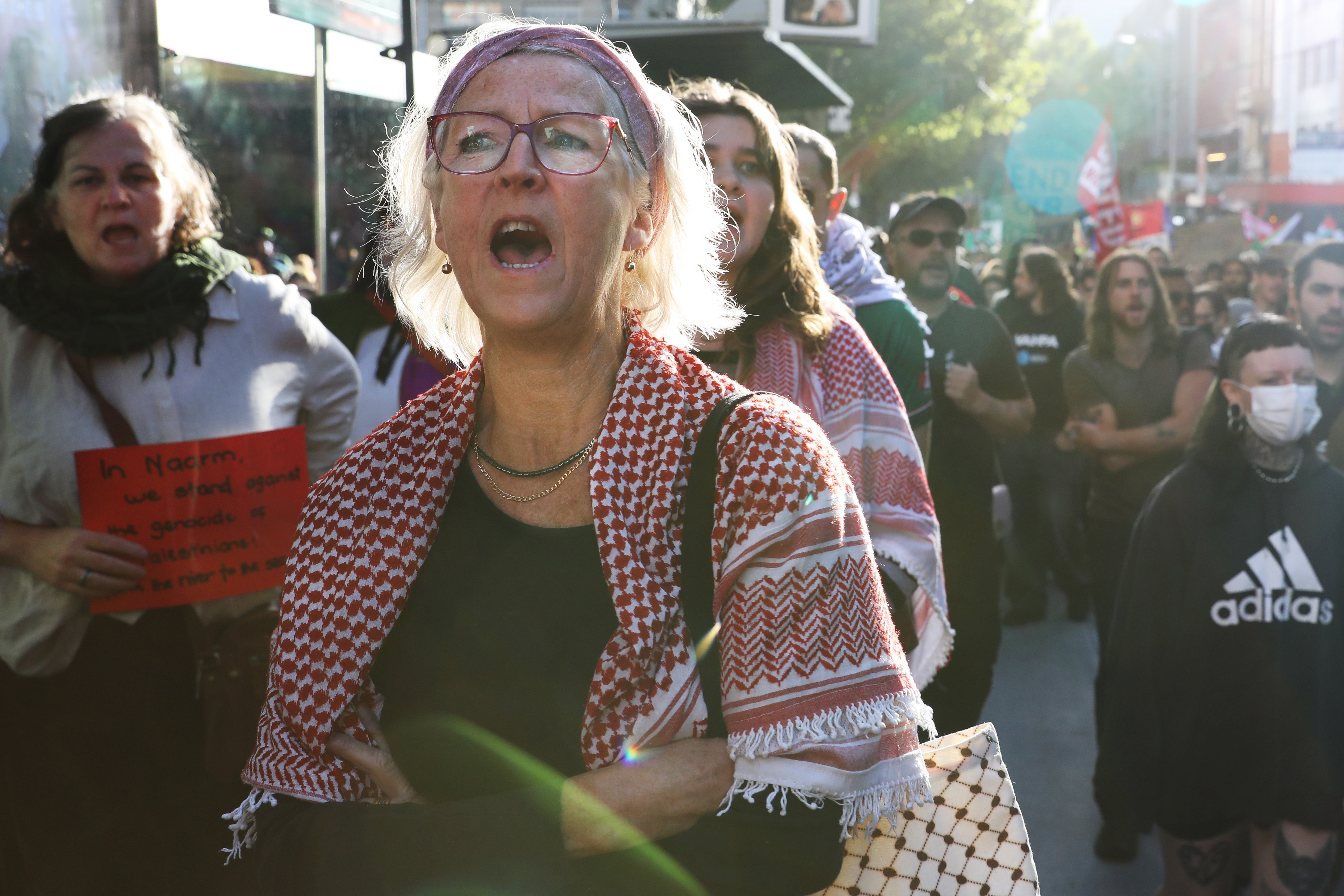 Protesters against the visit of the Israeli president march in Melbourne on 12 February 2026