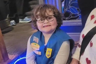 <p>Pim Neill, a six -year-old Girl Scout from Pennsylvania, has made history after selling over 100,000 boxes of cookies this year</p>