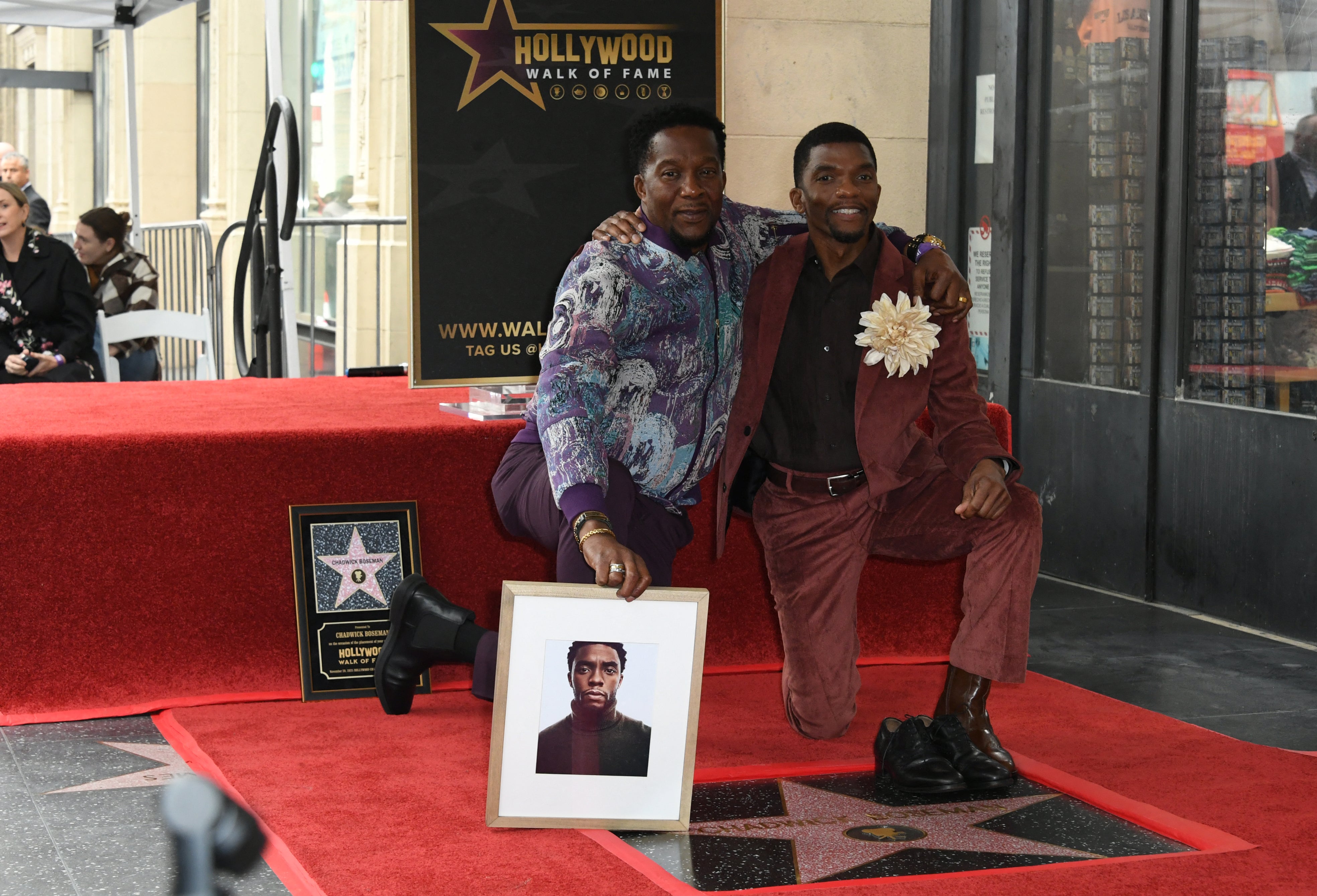 Brothers Derrick and Kevin Boseman pictured at their brother’s posthumous Hollywood Walk of Fame Star ceremony in Los Angeles in 2025