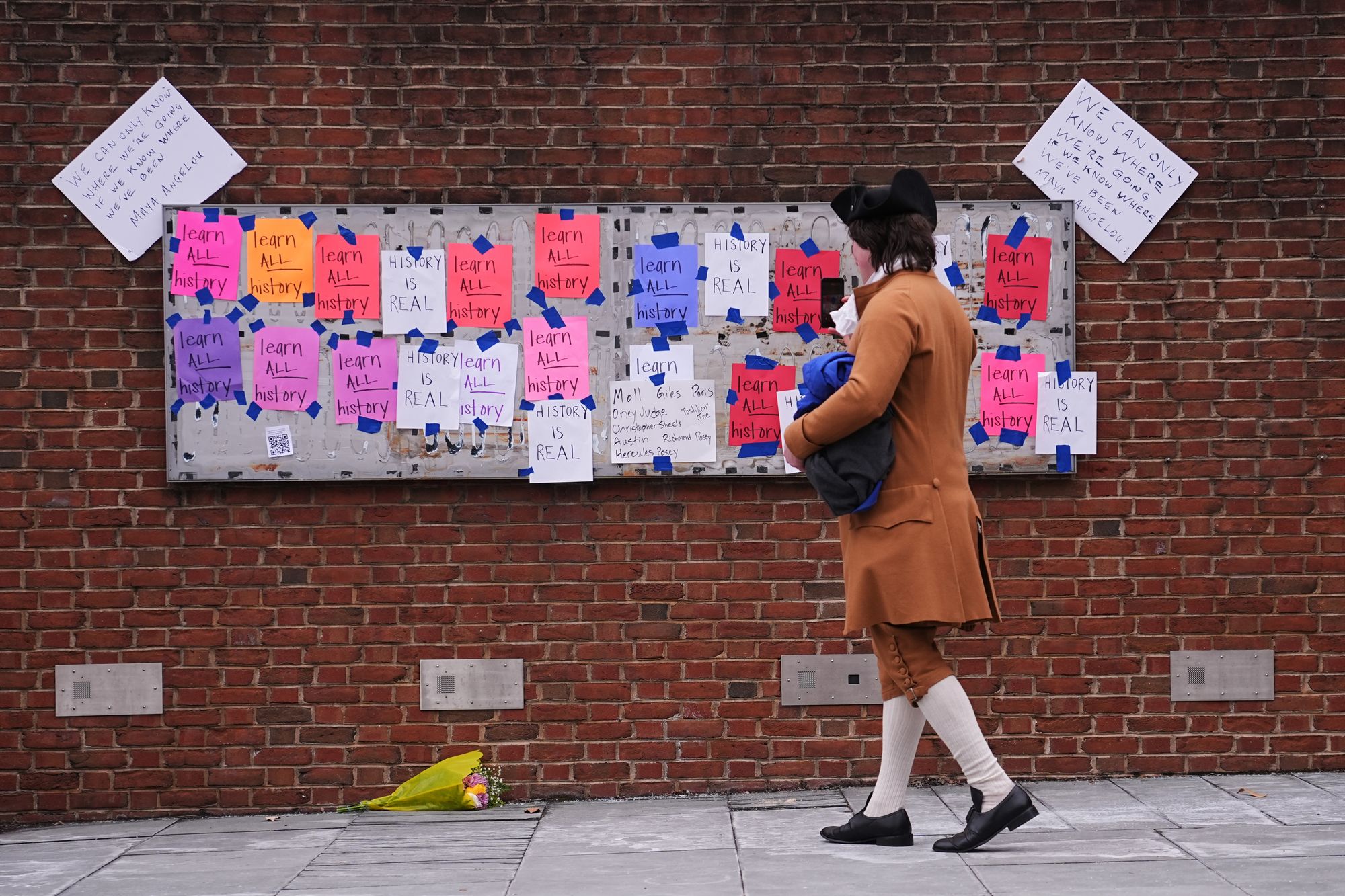 <p>A federal judge has ordered the Trump administration to restore all mentions of slavery and enslaved people at a Philadelphia landmark that was the home of George Washington, where protesters have left notes demanding the return of materials on the now-empty slabs</p>