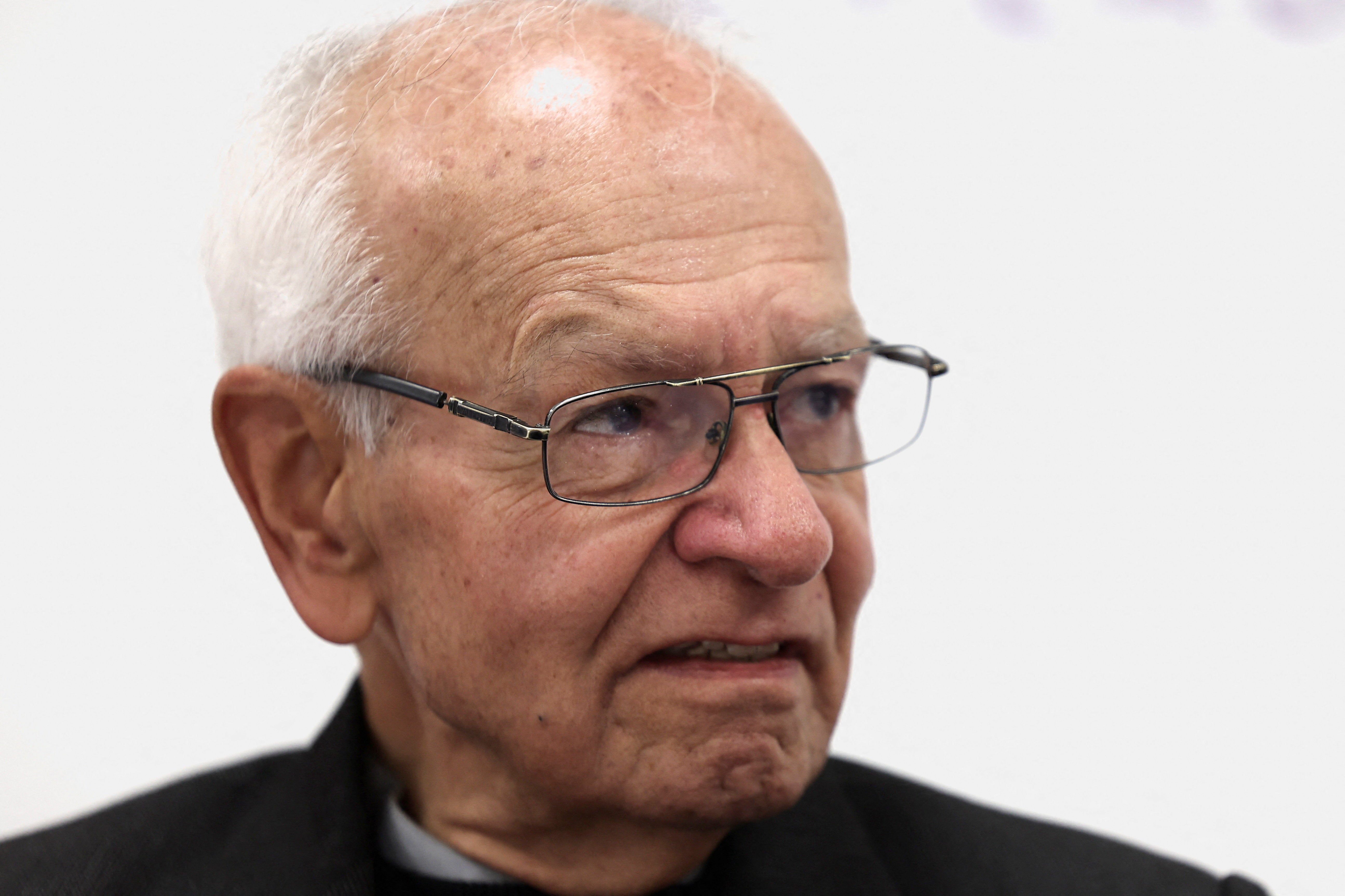 Javier Giraldo, a Catholic priest well-known for his activism on behalf of conflict victims, attends a press conference on the identification of the remains of Camilo Torres