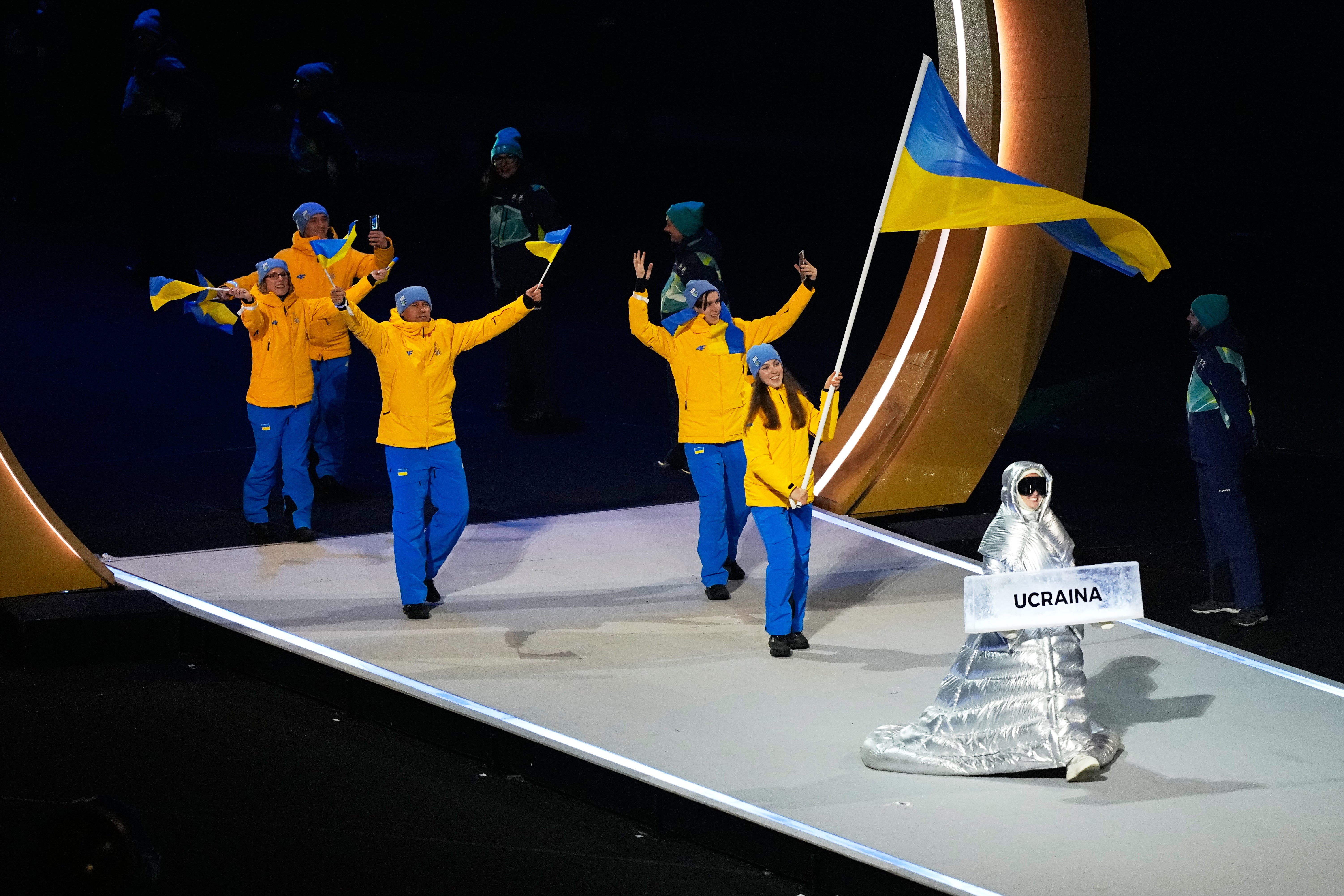 Athletes from Ukraine attend the Olympic opening ceremony at the 2026 Winter Olympics, in Milan, Italy, Friday, Feb. 6, 2026. (AP Photo/Petr David Josek)