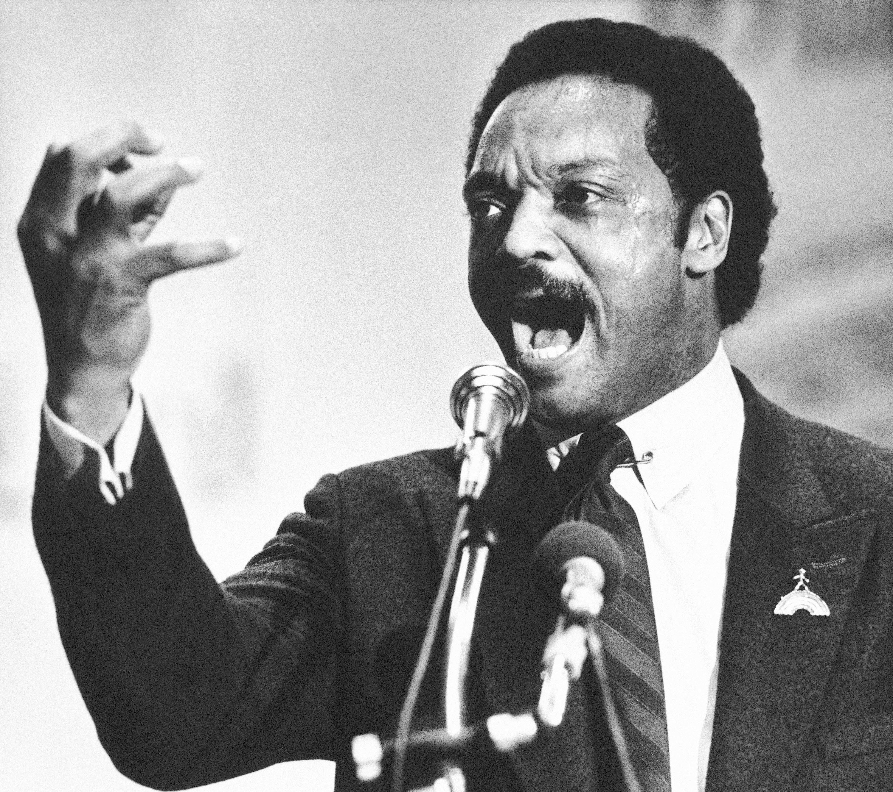 Jesse Jackson speaks to a group of his supporters at a rally in Dayton, Ohio, on April 14, 1984