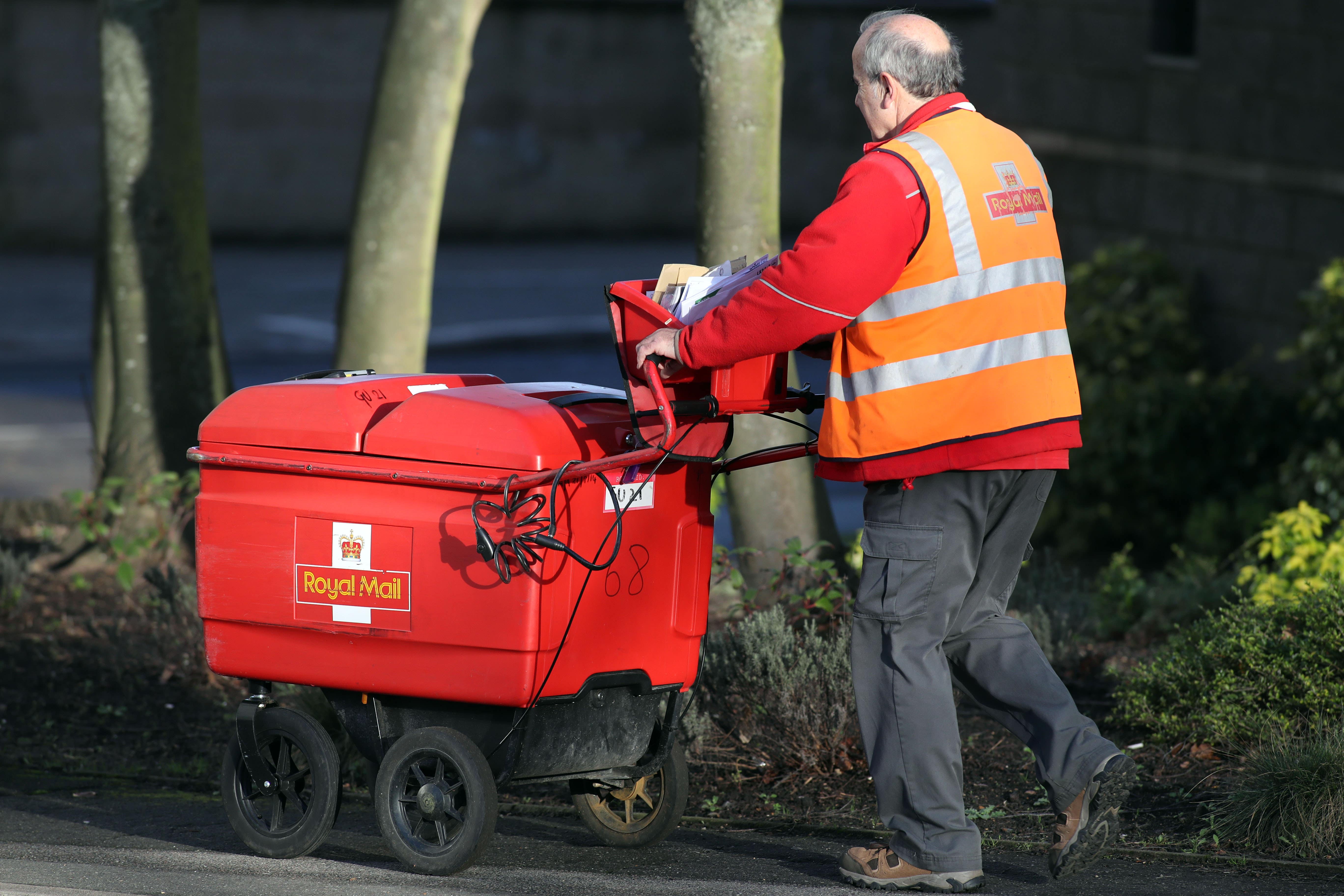 Royal Mail has been asked to respond to a group of MPs about the postal service (Steve Parsons/PA)