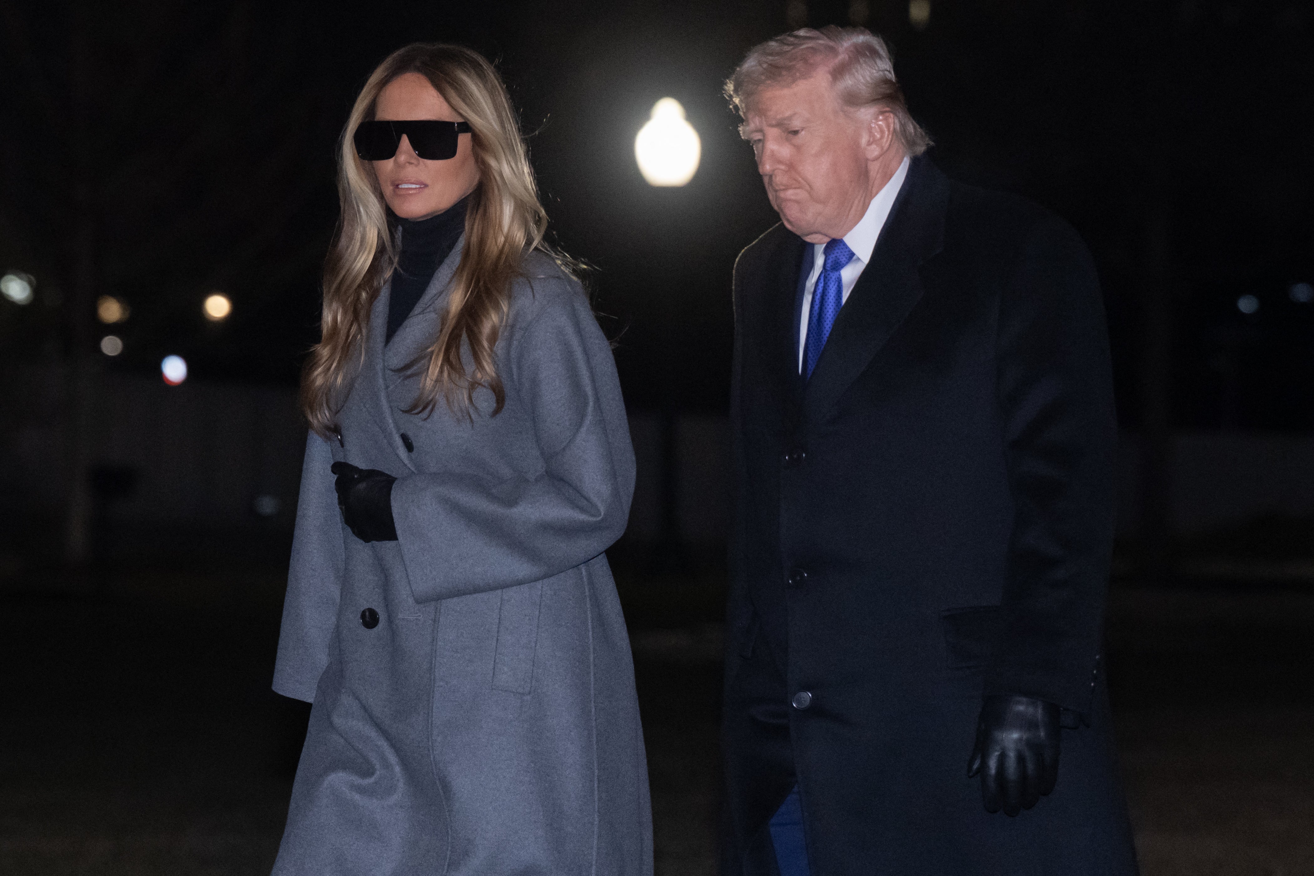 <p>First Lady Melania Trump was seen sporting sunglasses in the dead of night, sparking questions among social media users</p>