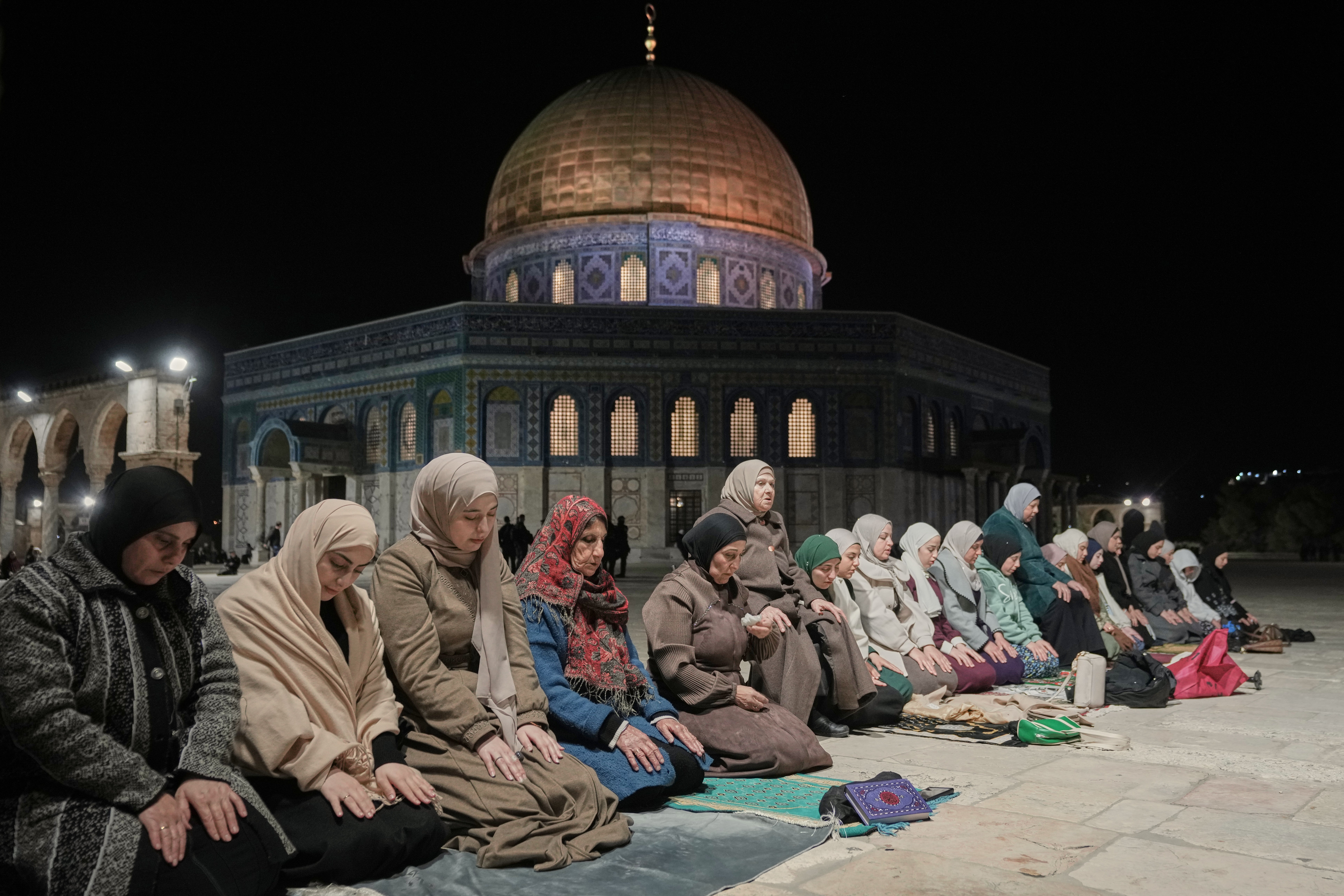 Muslim worshippers perform the evening Tarawih prayers during the holy fasting month of Ramadan