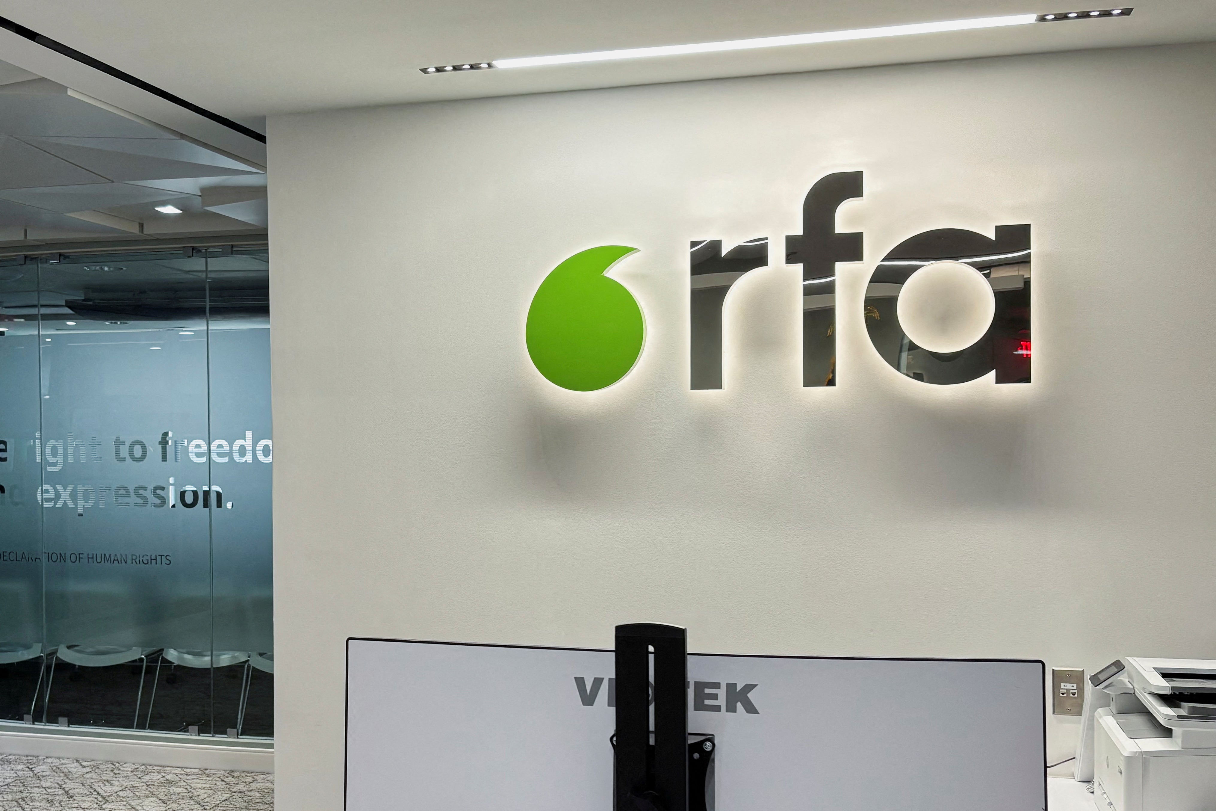 File. A logo of Radio Free Asia is displayed in its office in Washington, DC, on 15 March 2025