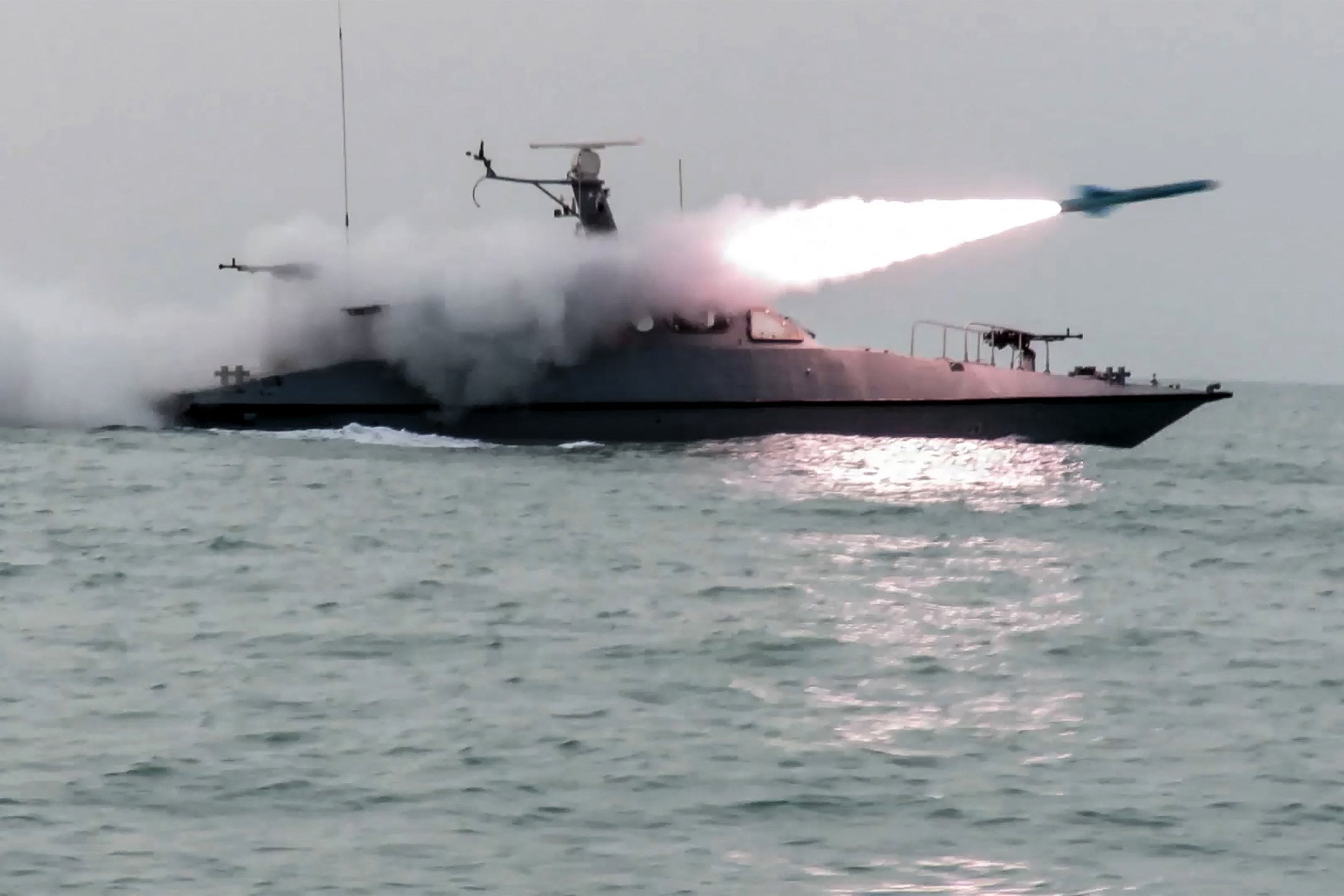 Iran's Islamic Revolutionary Guard Corps began a series of military exercises in the Strait of Hormuz on Monday, on the eve of talks with the United States.