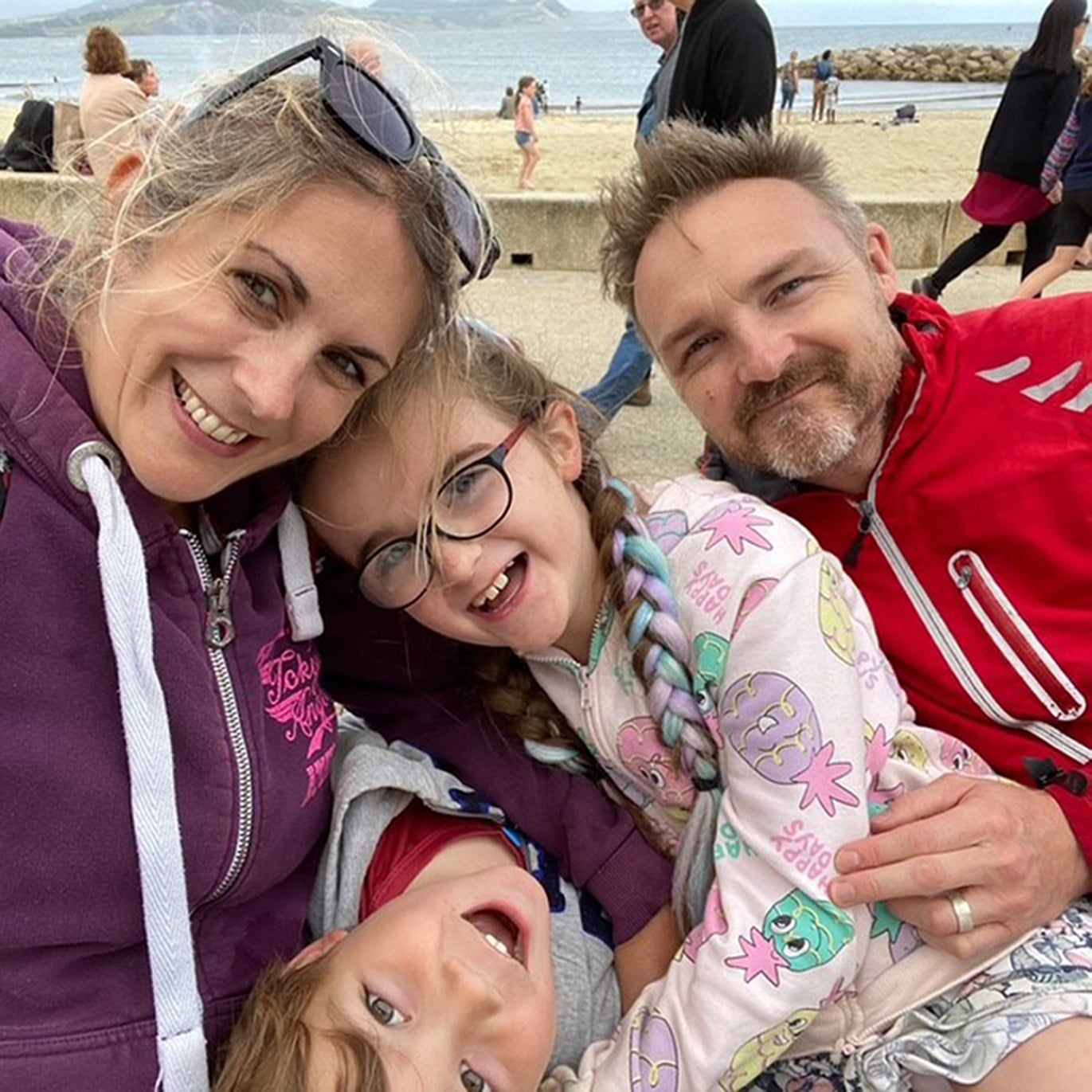 Sophia Chant with her family at the beach