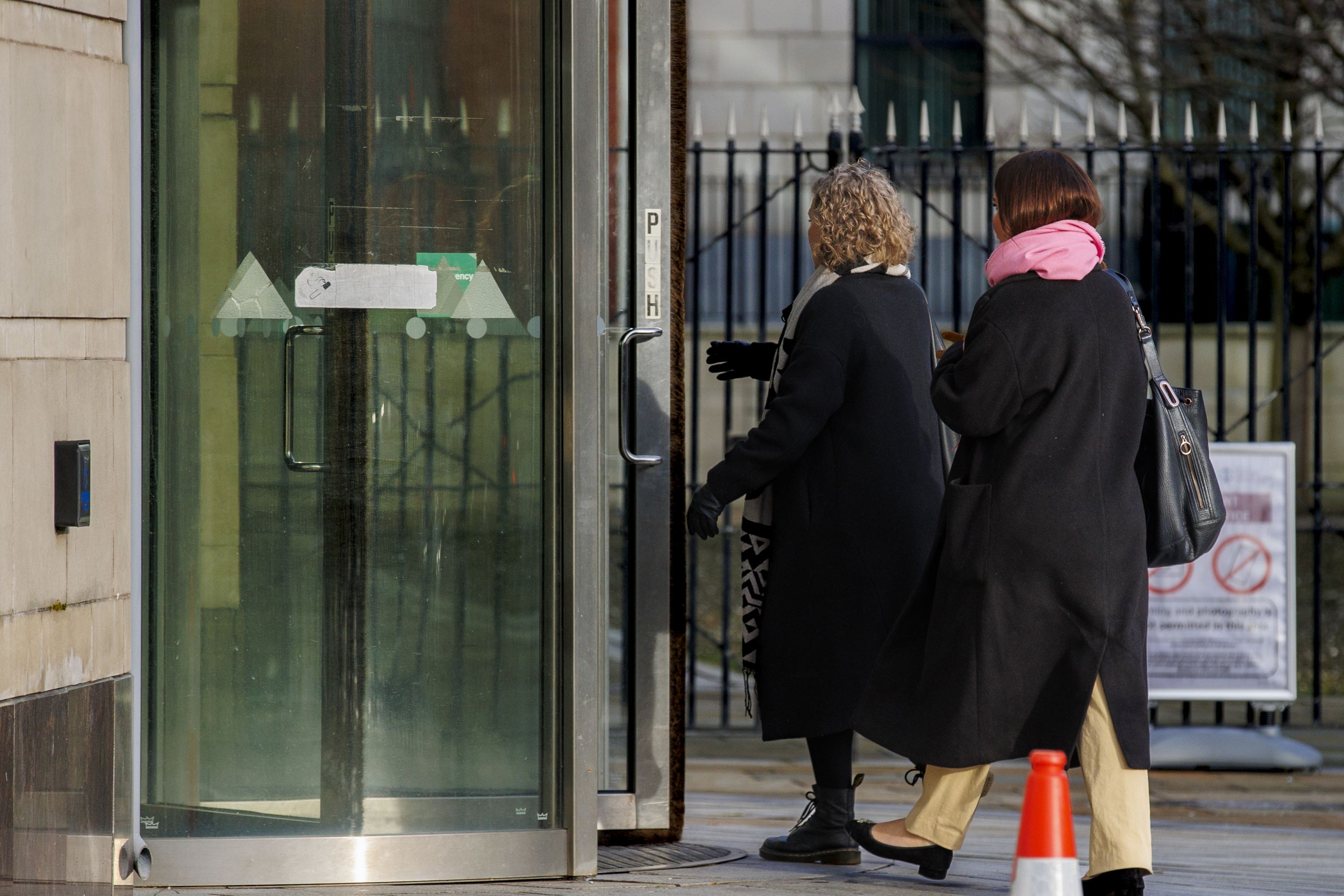 Fiona Donohoe (left), the mother of 14-year-old Noah Donohoe, with her sister Niamh Donohoe outside Belfast Coroner’s Court (
