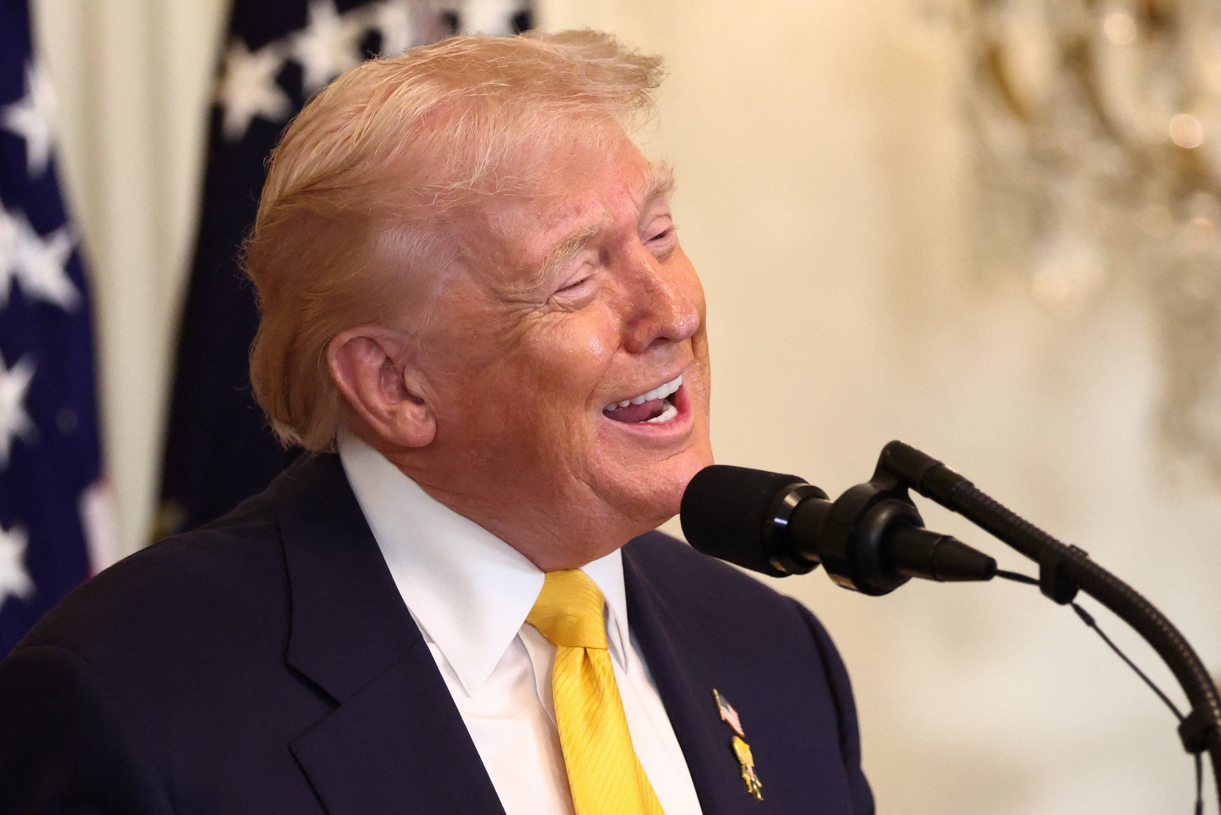 U.S. President Donald Trump speaks during a Black History Month reception at the White House in Washington, D.C., U.S., February 18, 2026. REUTERS/Kevin Lamarque