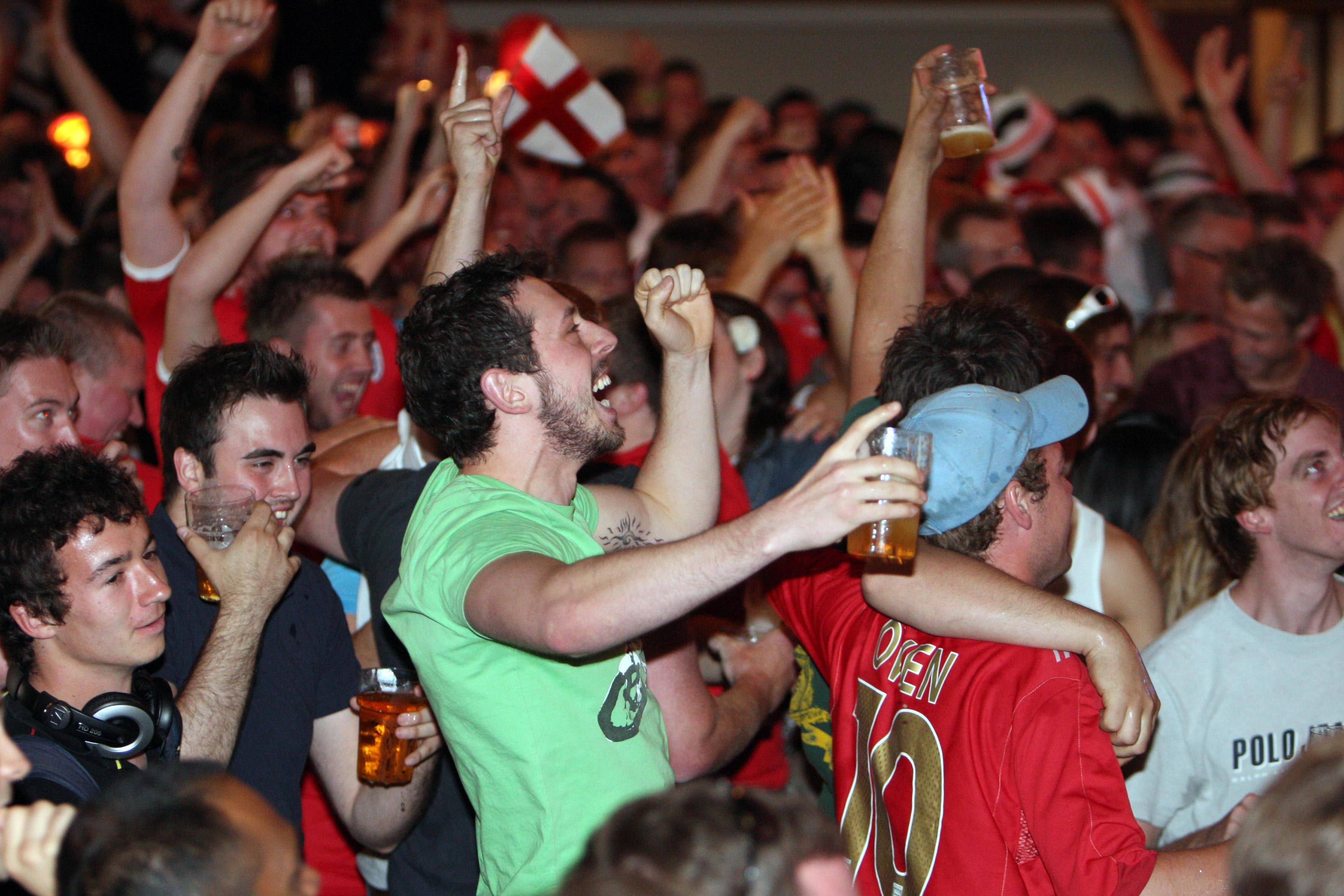 England fans watching football in the pub (Chris Radburn/PA)