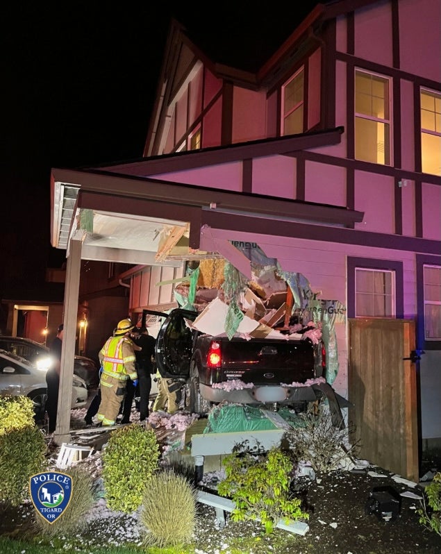 A pickup truck crashed into an Oregon home in the middle of the night after launching about 100 feet through the air