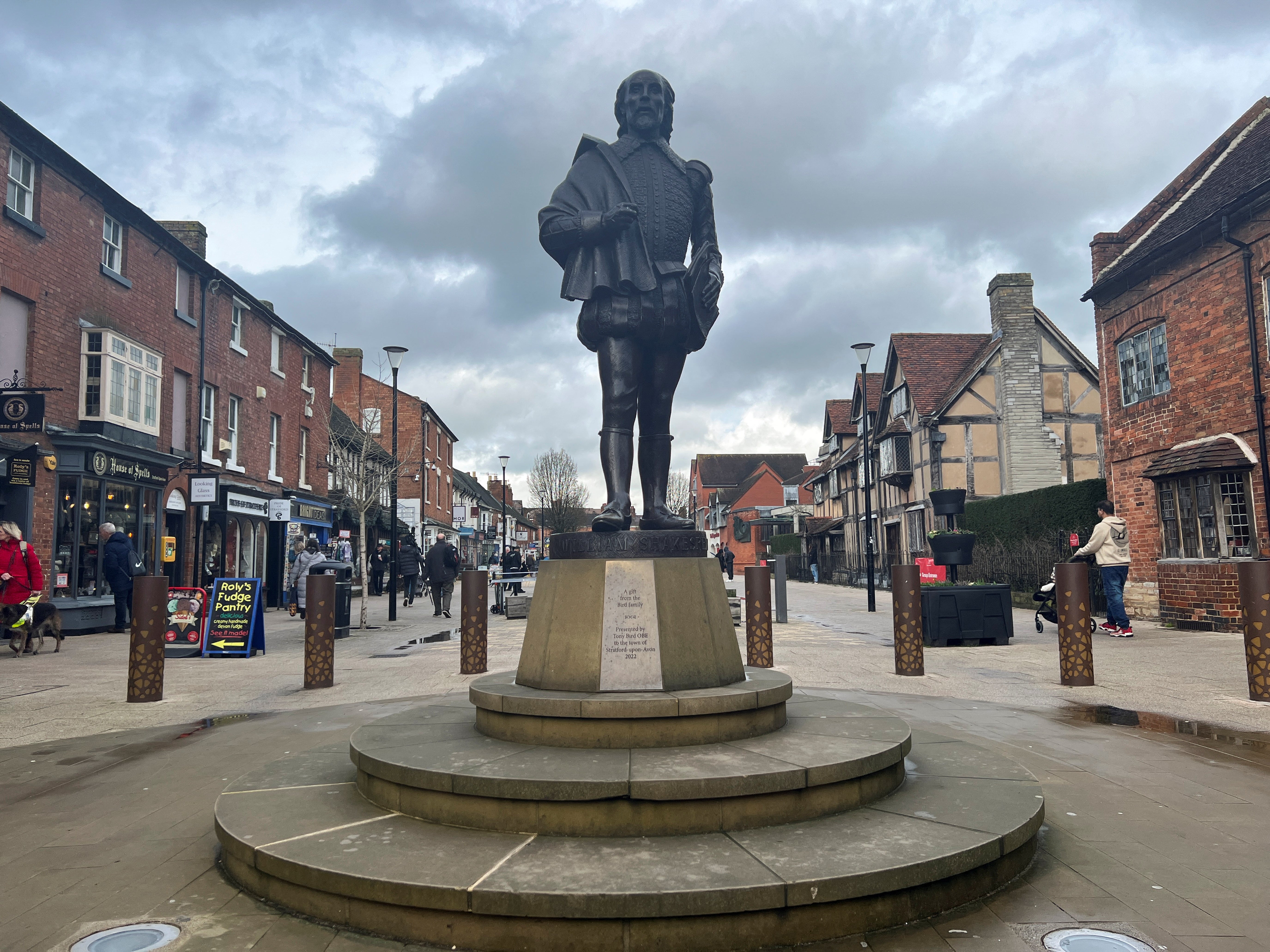 A statue of William Shakespeare stands outside his childhood home, in Stratford-upon-Avon