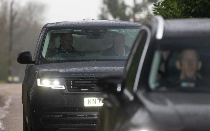 Police cars pictured at the Sandringham estate where Andrew has been arrested