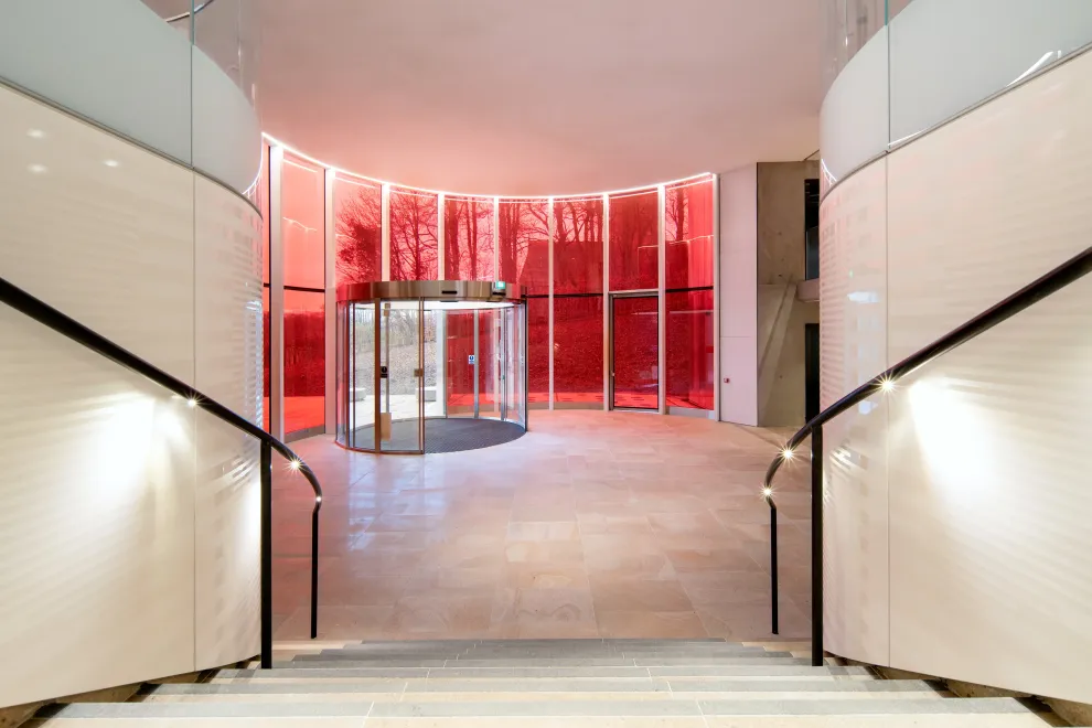 The striking red glass entrance