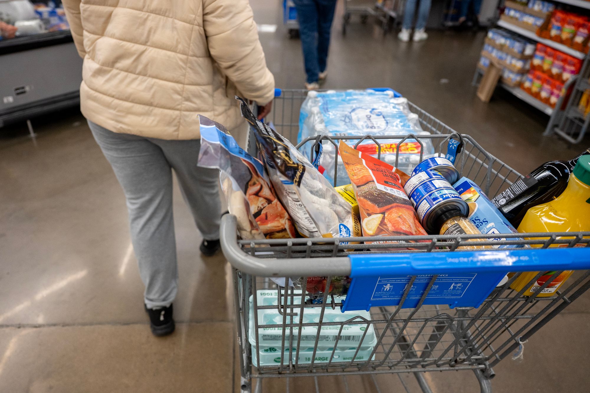 Walmart has managed higher costs both by shifting what it offers on store shelves while absorbing some higher costs