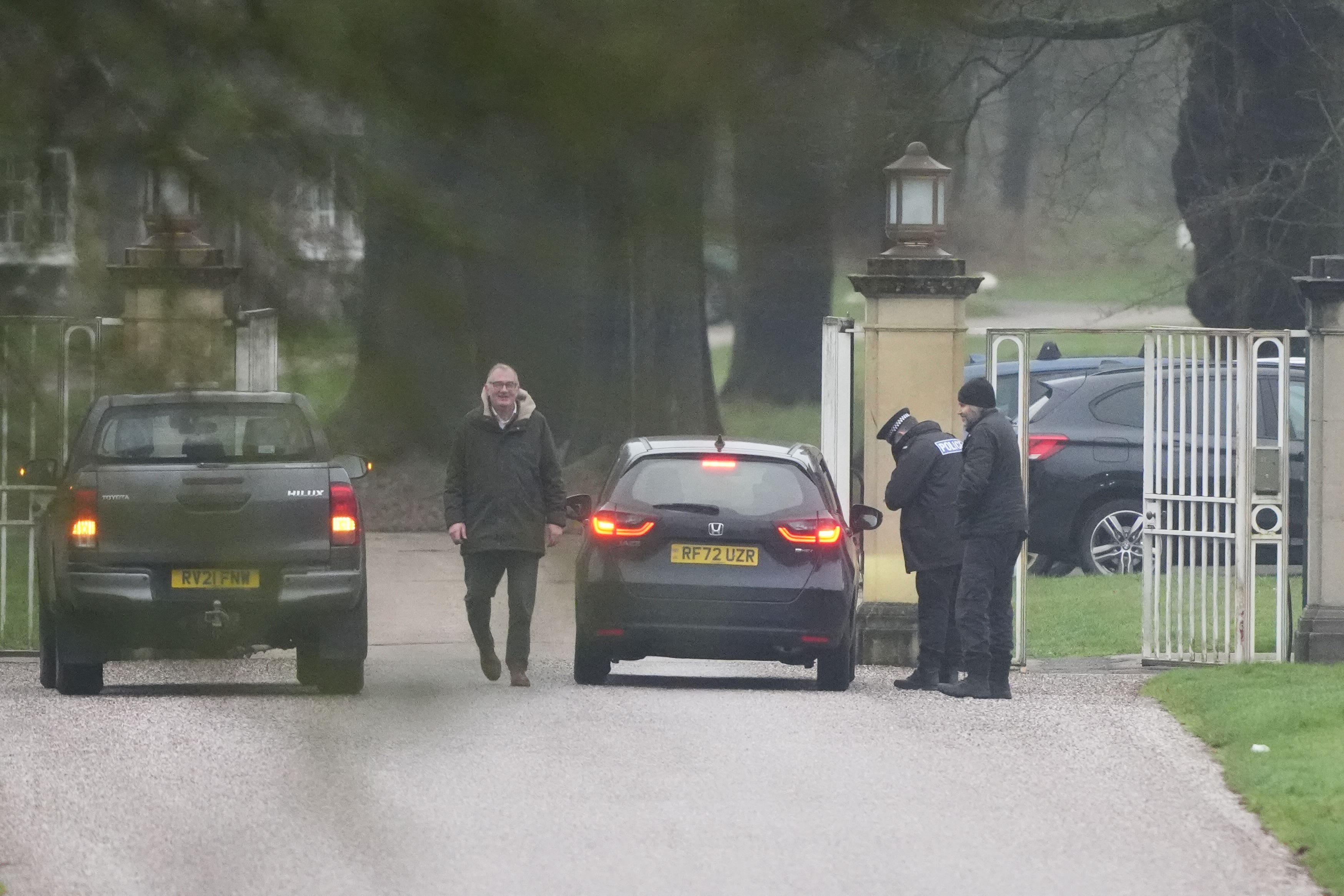 A police officer at the gates at Royal Lodge in Windsor where a search is underway