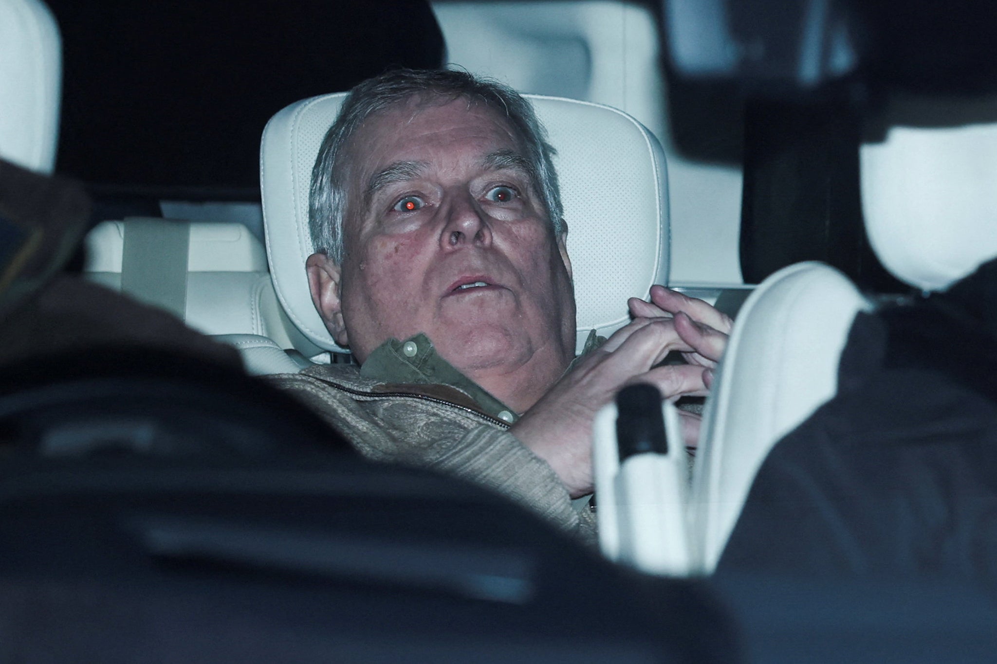 Andrew Mountbatten-Windsor, formerly known as Prince Andrew, leaves Aylsham police station on the day he was arrested