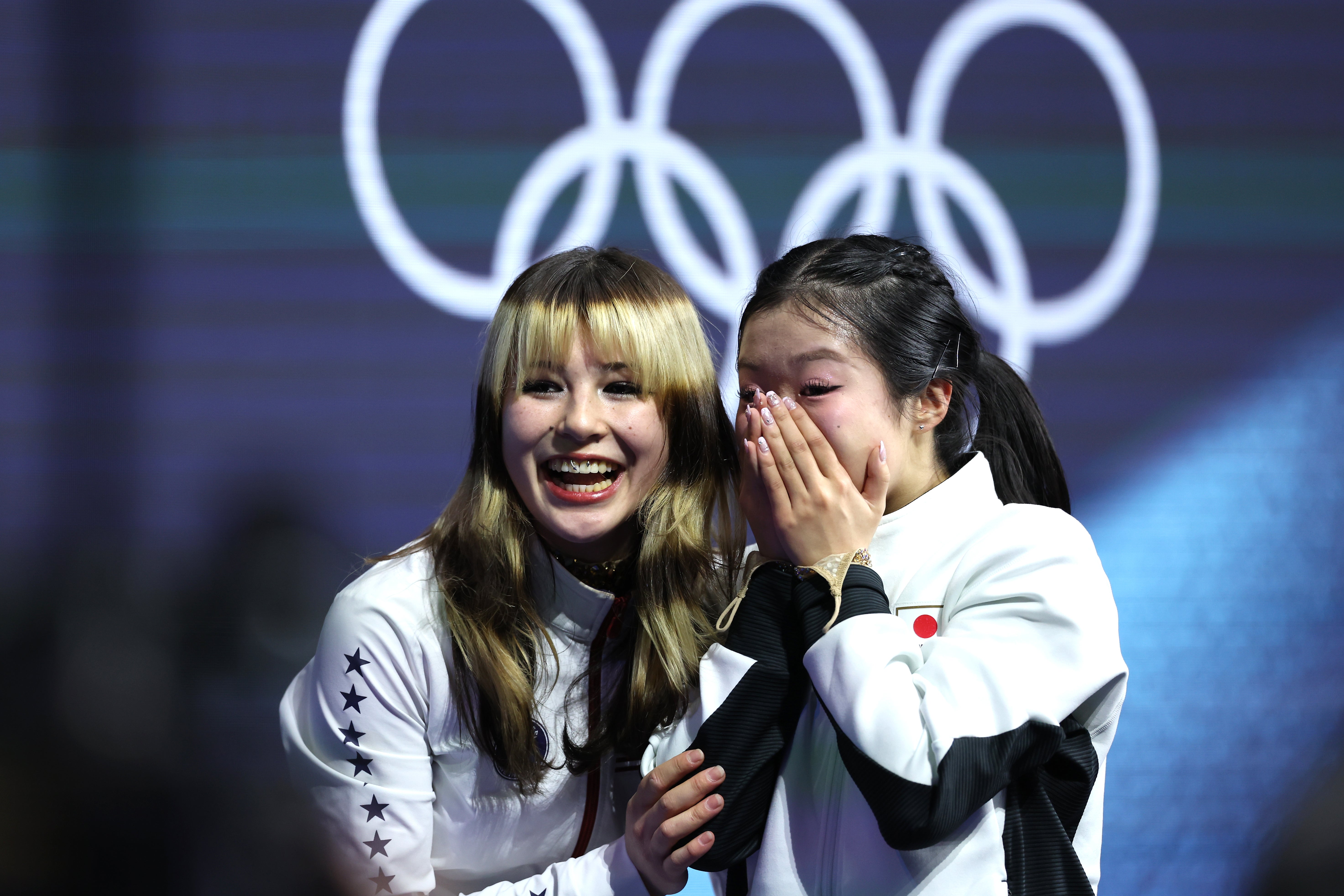 Japan’s bronze medallist Ami Nakai (right) was congratulated by winner Alysa Liu (Fabrizio Carabelli/PA)
