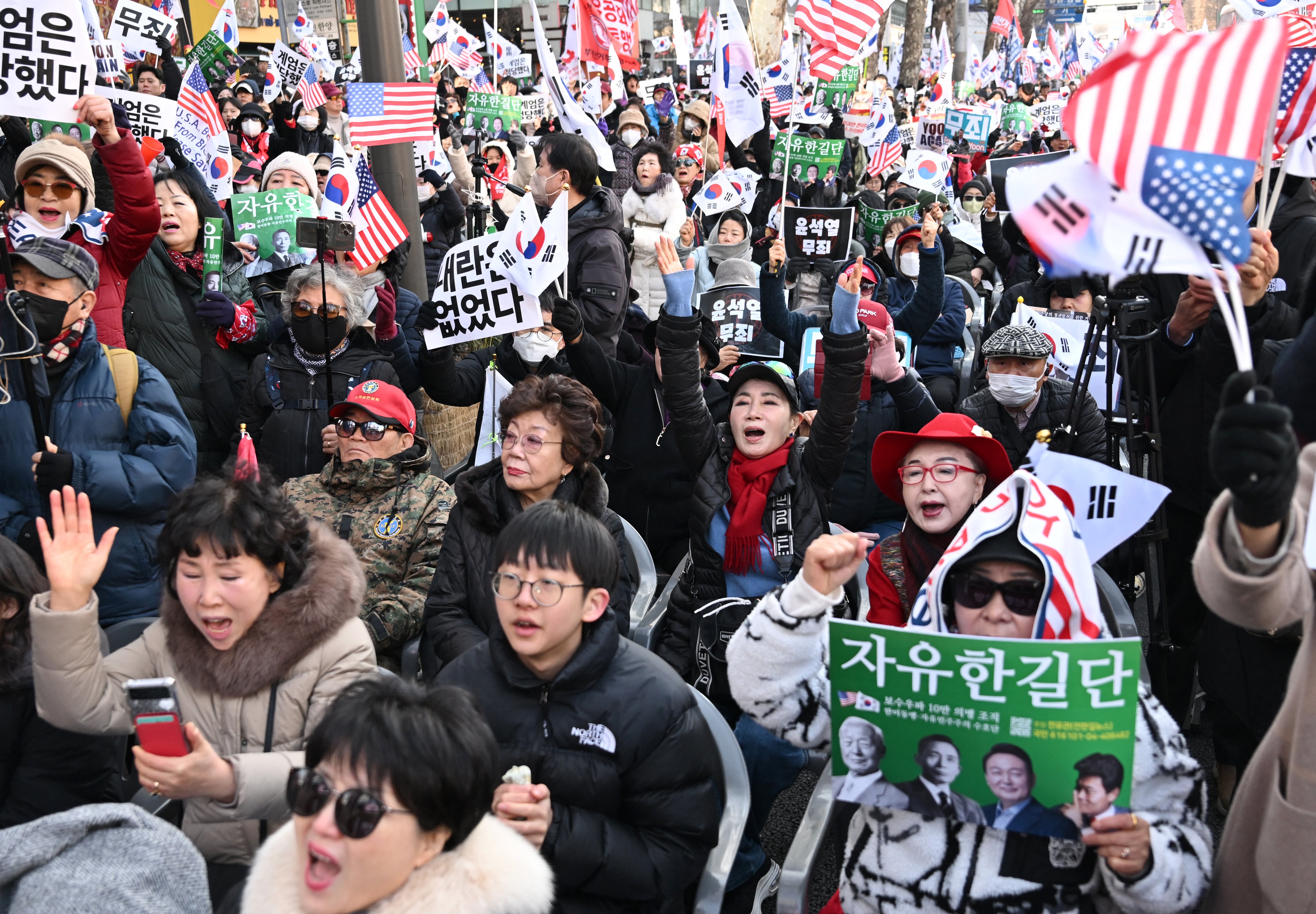Supporters of the impeached former president outside the court house, who reacted with intense emotion when the verdict was announced