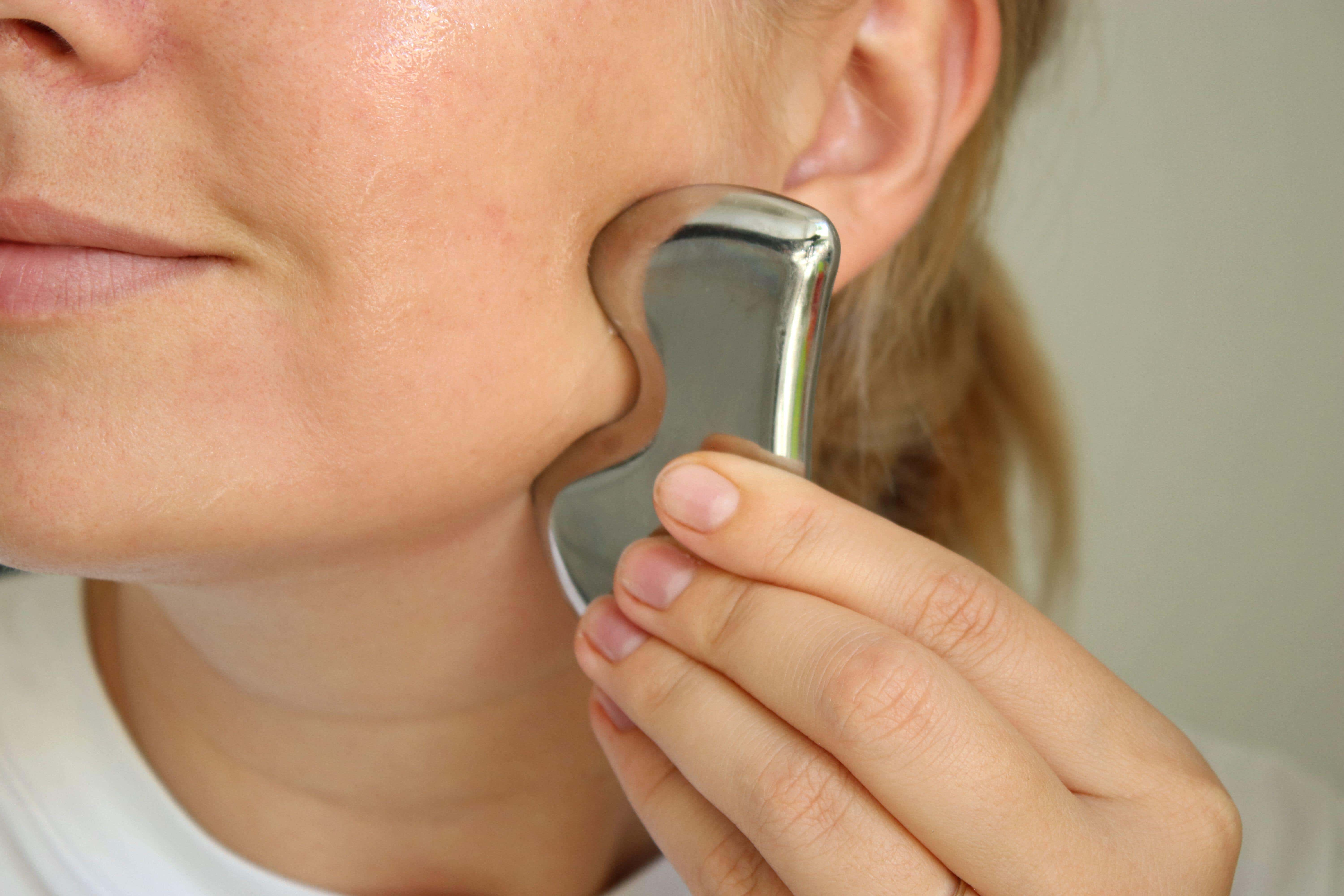 Here’s how you should be using a gua sha (Alamy/PA)