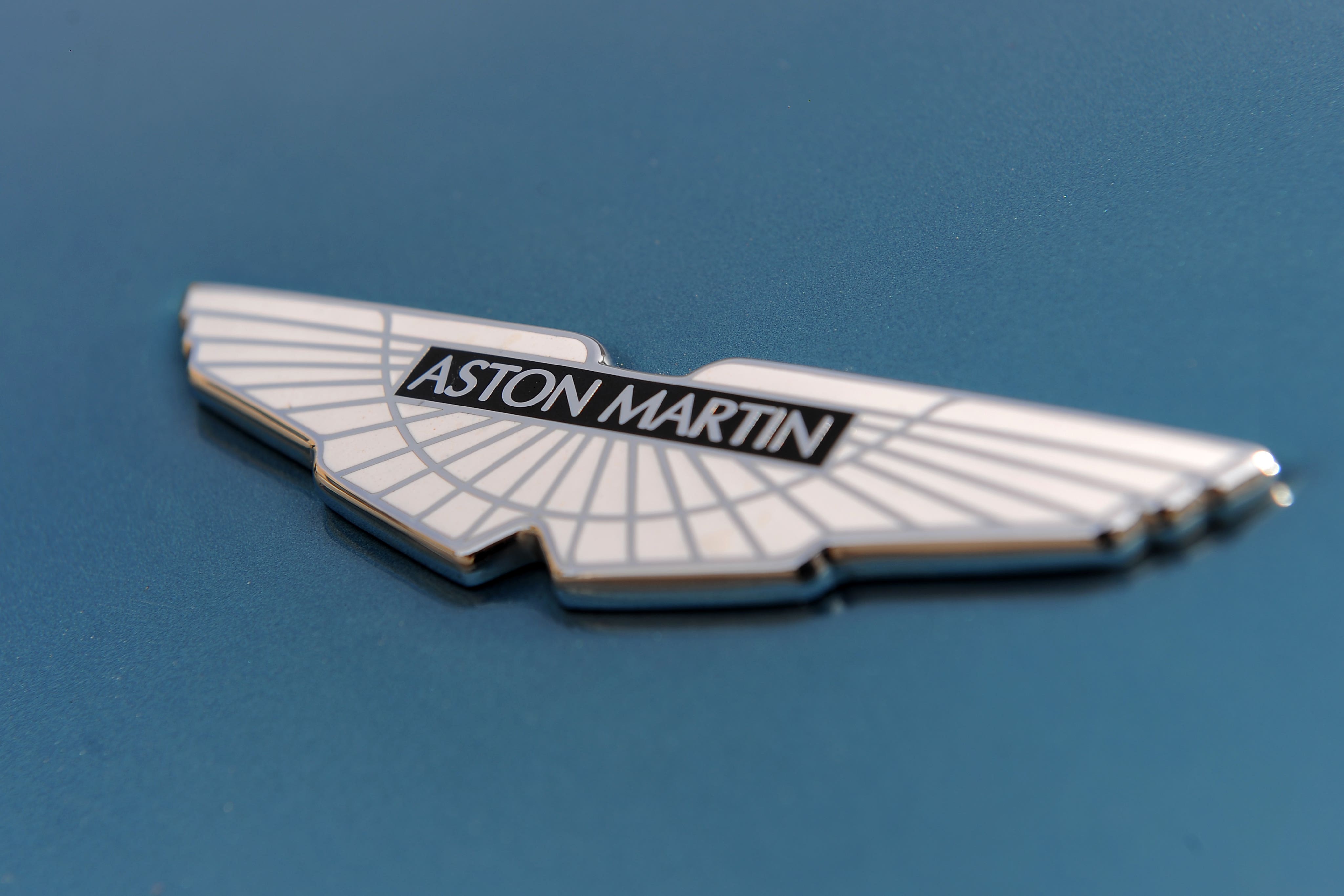 Aston Martin has warned it will post lower-than-expected profits for the past year on the back of falling sales as it battles pressure from US tariffs (Joe Giddens/PA)
