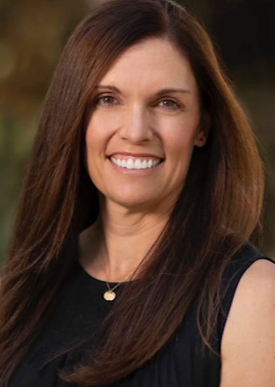 Carrie Atkin is survived by her husband and two children