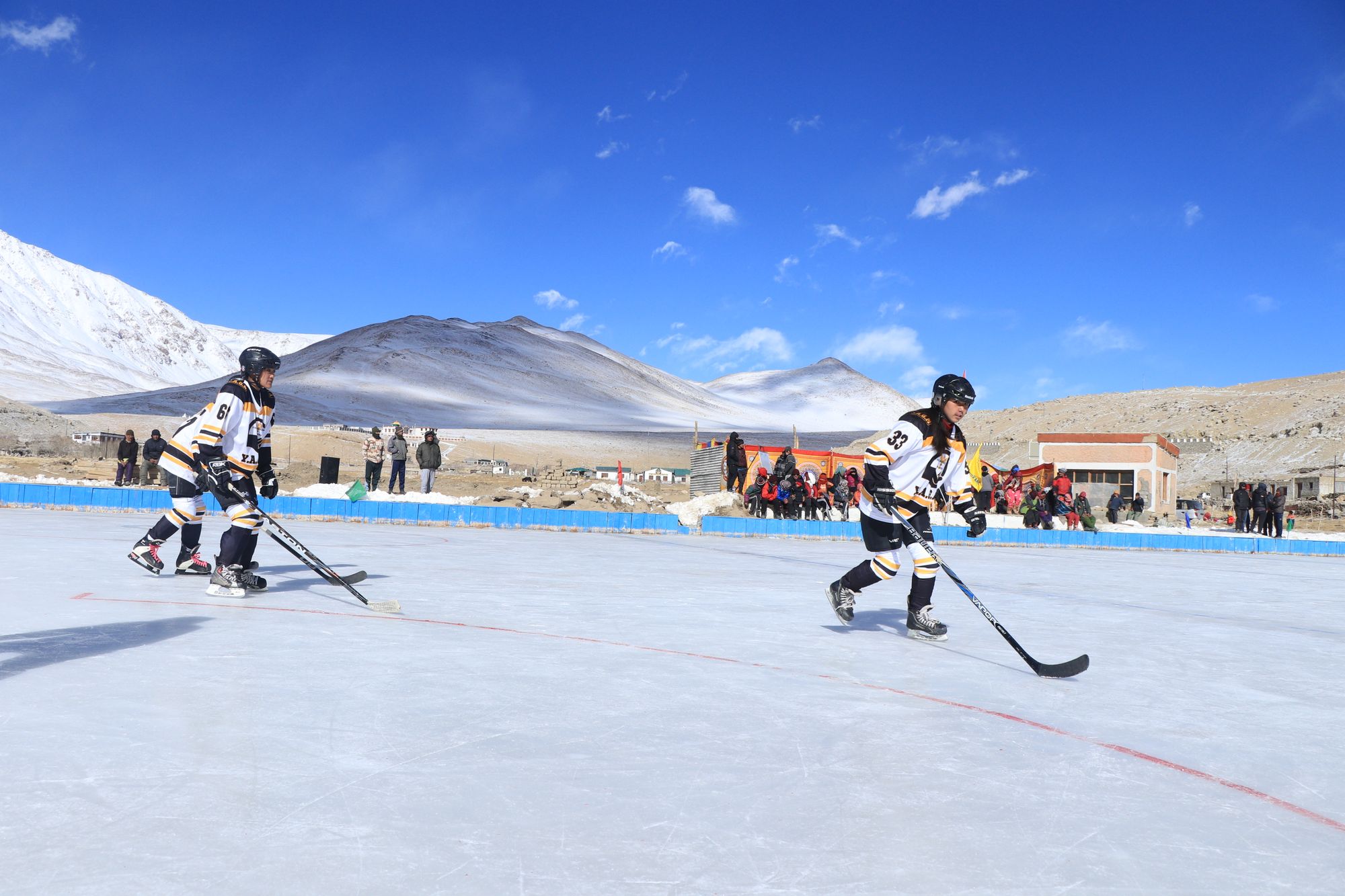 Women playing ice hockey in Ladakh