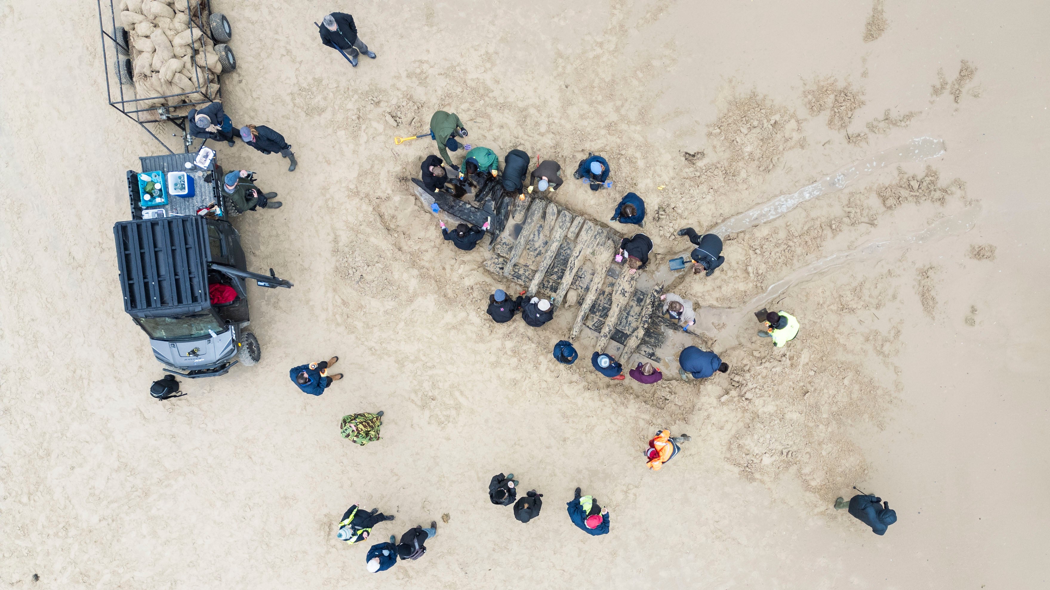 Archaeologists have successfully excavated a section of a 17th century shipwreck that was uncovered by winter storms on the edge of a nudist beach