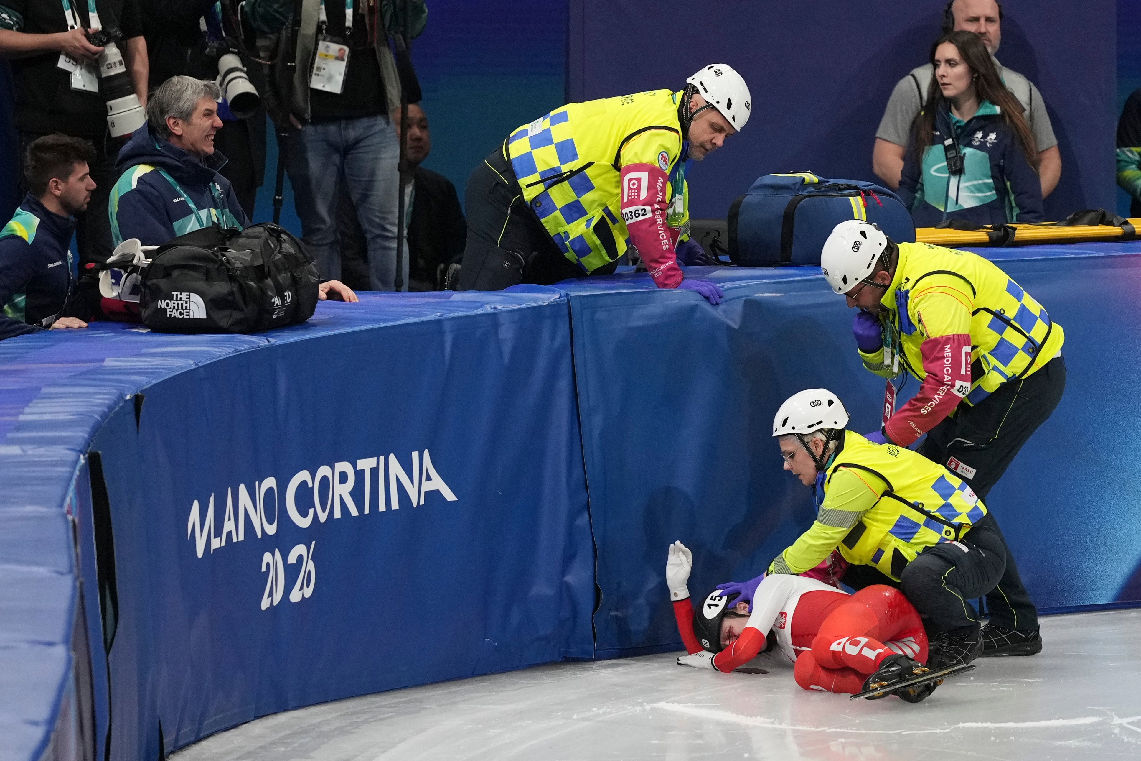 Medics tend to Kamila Sellier after her fall