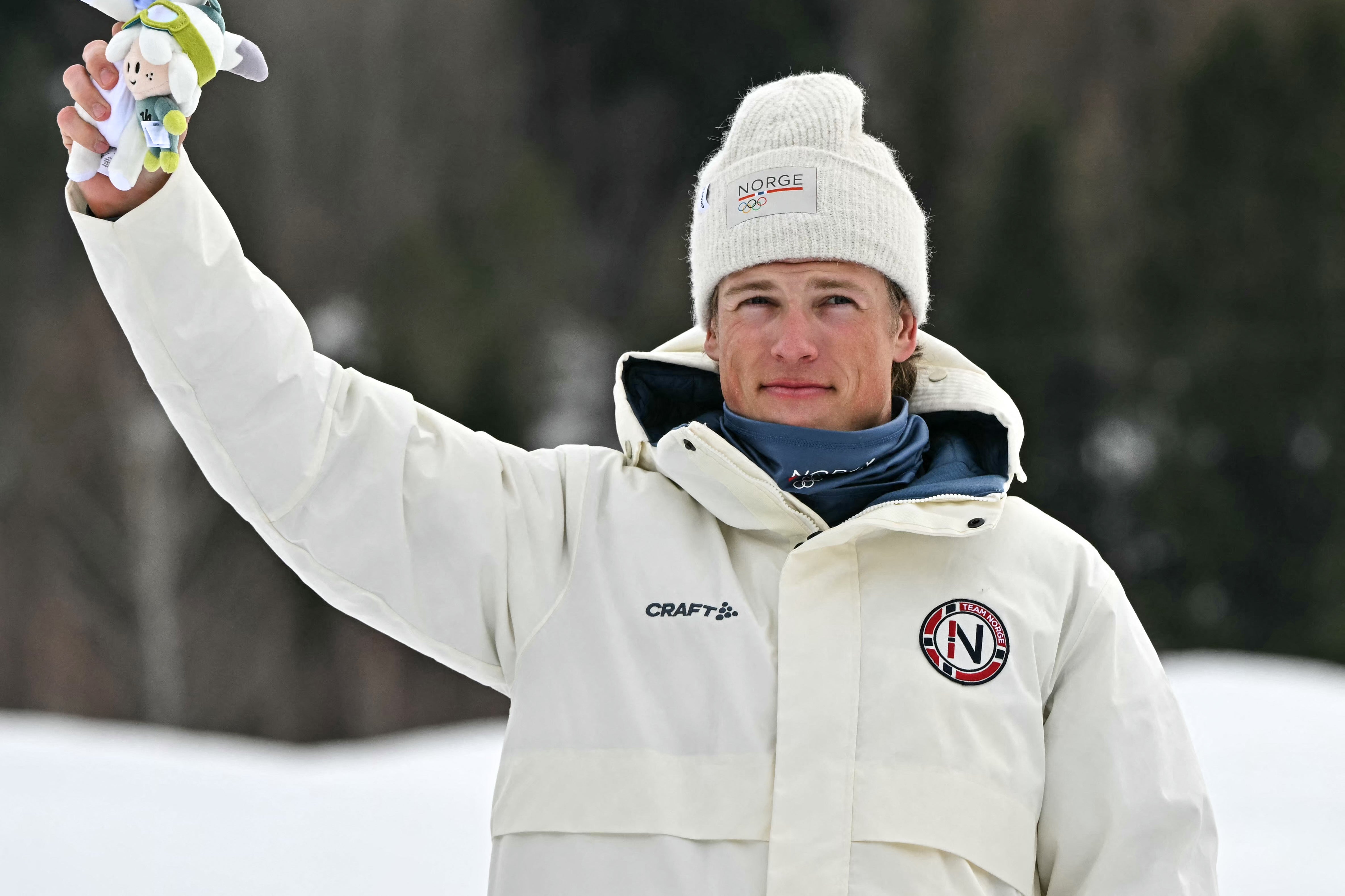 Johannes Hoesflot Klaebo celebrates after winning his sixth gold of the Games