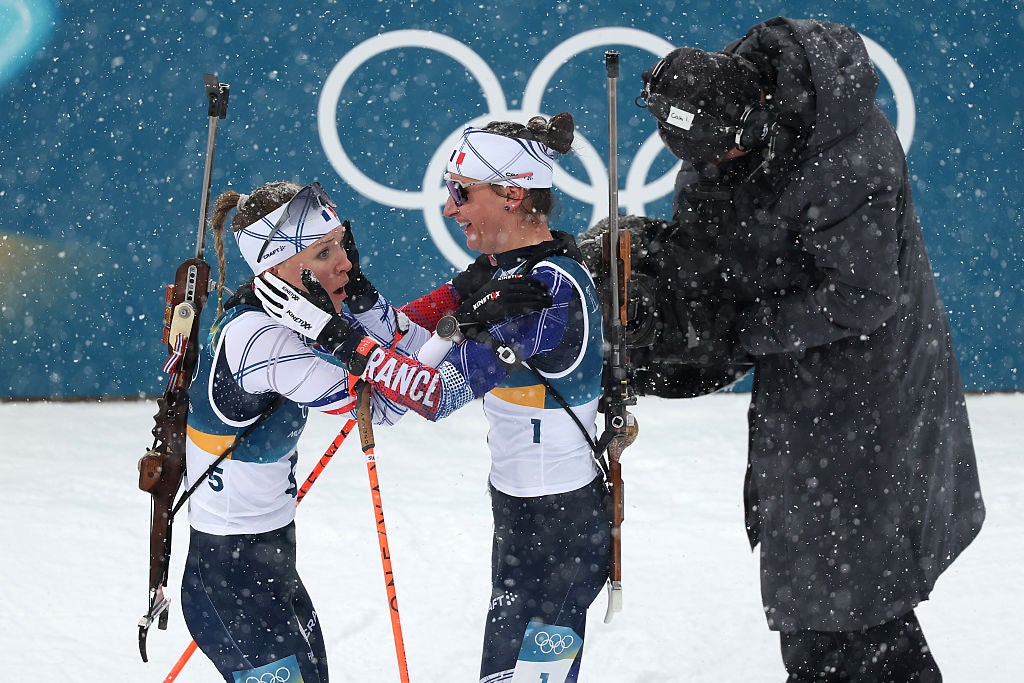 Julia Simon congratulated teammate and gold medallist Oceane Michelon