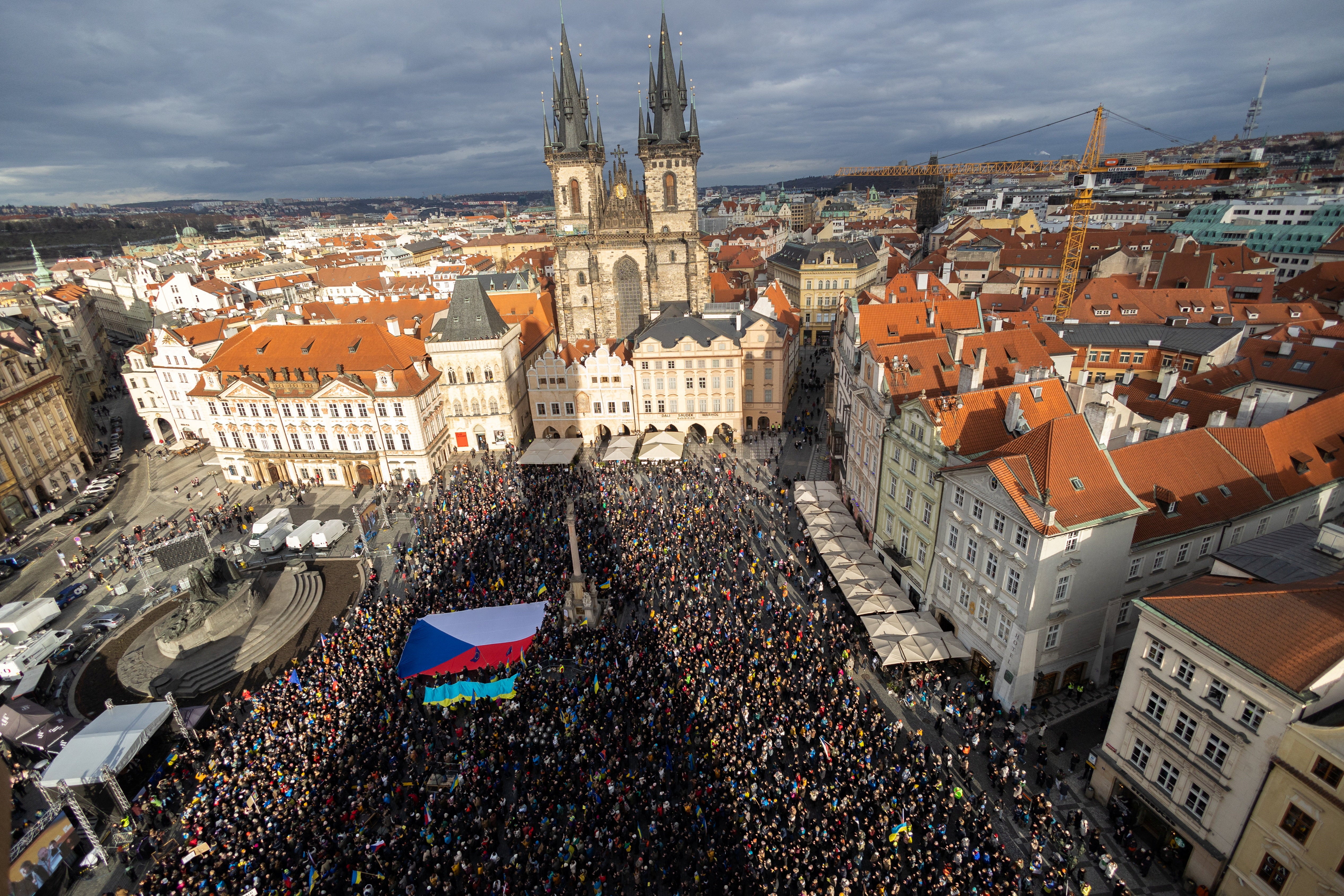 People attend a protest to mark the four-year anniversary of the Russian invasion of Ukraine, at the Old Town Square, in Prague, Czech Republic, 21 February, 2026.
