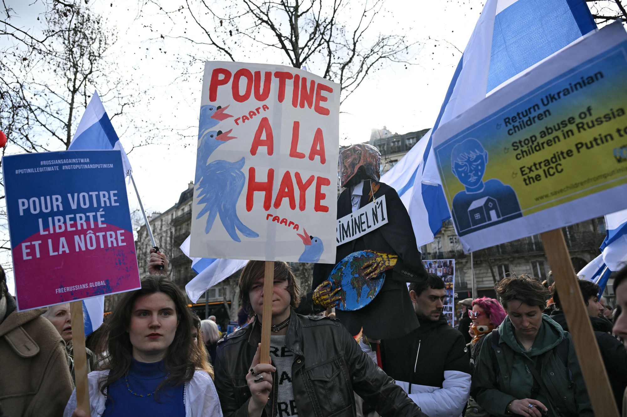 People gather during a march for Ukraine ahead of the fourth anniversary of Russia's invasion, in Paris on 21 February, 2026.