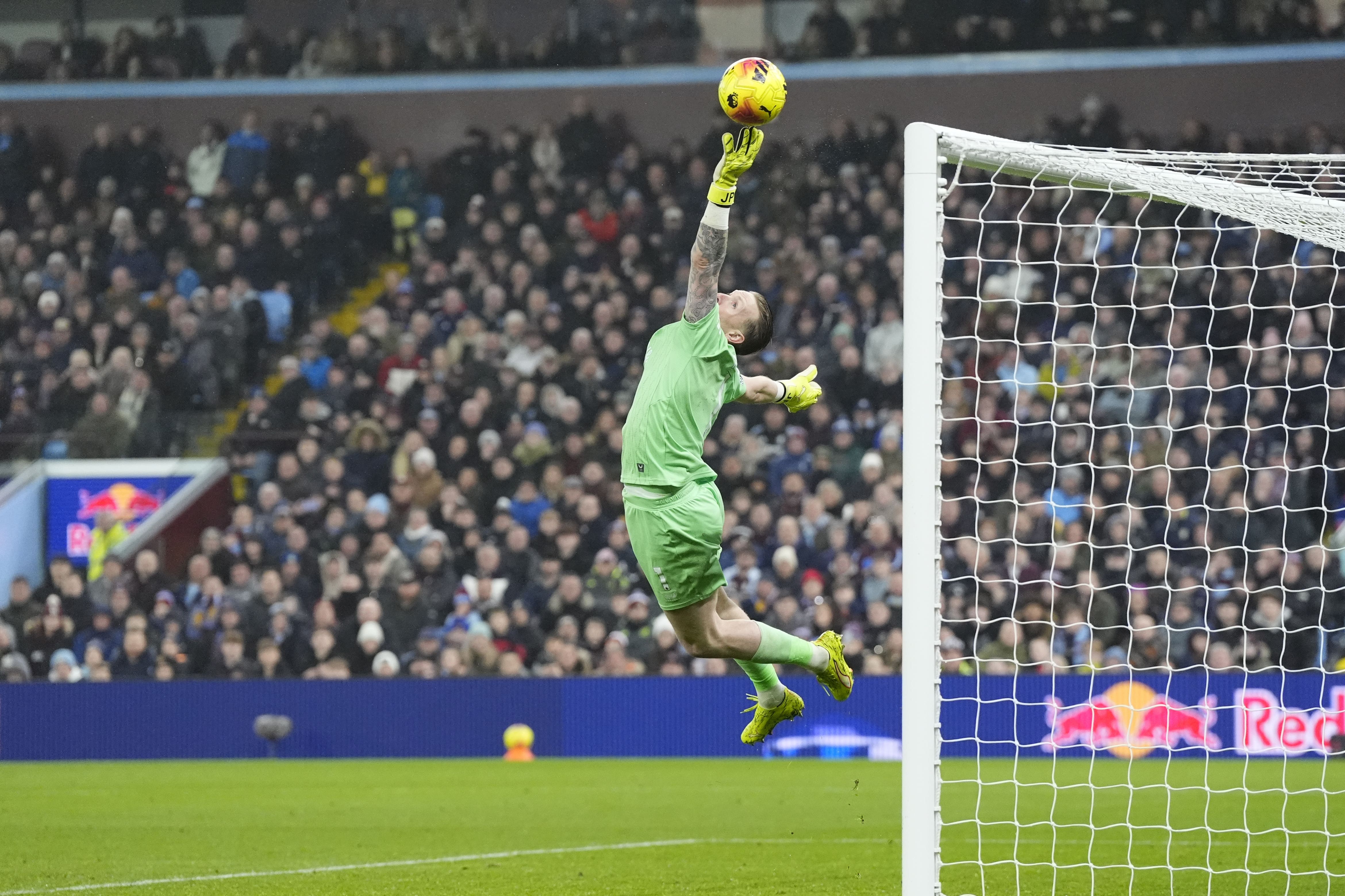 Everton goalkeeper Jordan Pickford tips over a shot from Aston Villa’s Morgan Rogers (not pictured), (Nick Potts/PA).