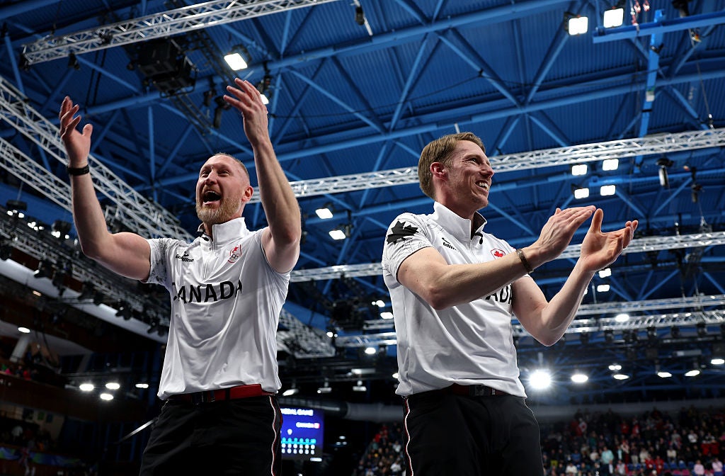 Canadian veterans Jacobs and Kennedy celebrate