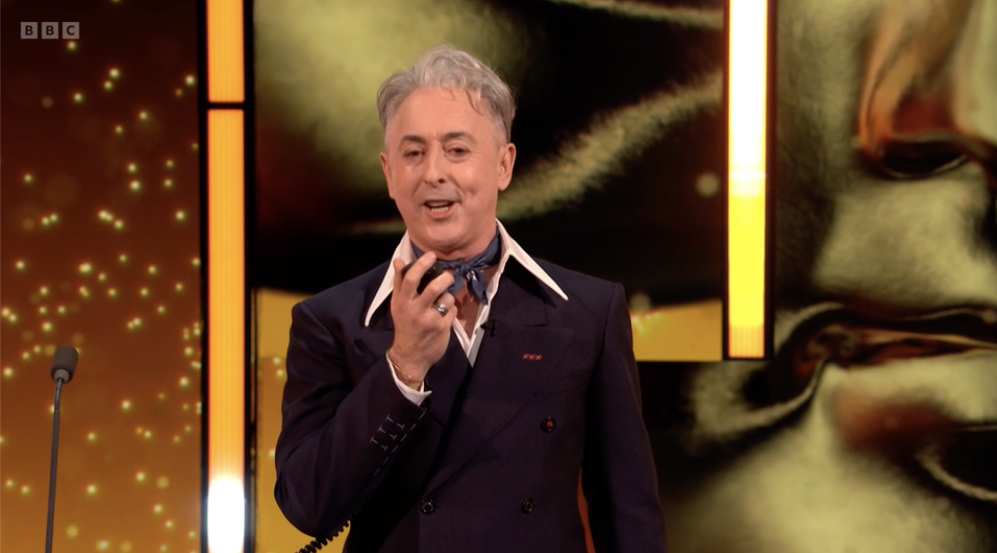 <p>Alan Cumming during his subdued opening monologue</p>