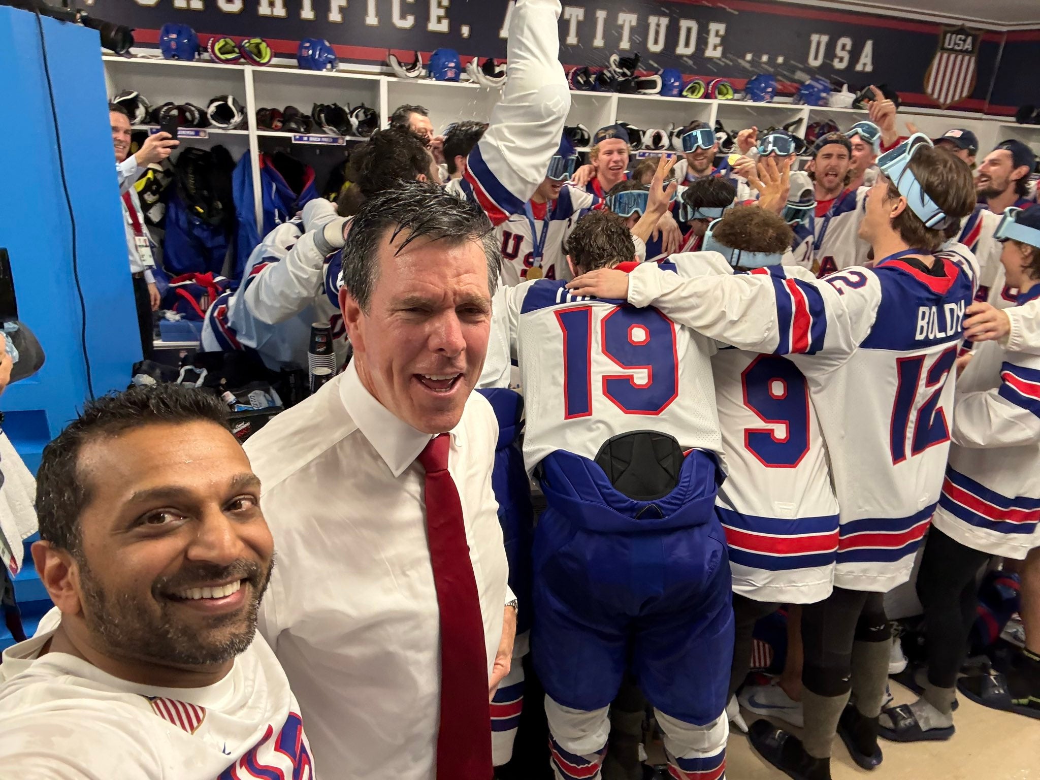 FBI Director Kash Patel celebrated with the US men's hockey team at the Winter Olympics in Italy after the team defeated Canada to take home a gold medal