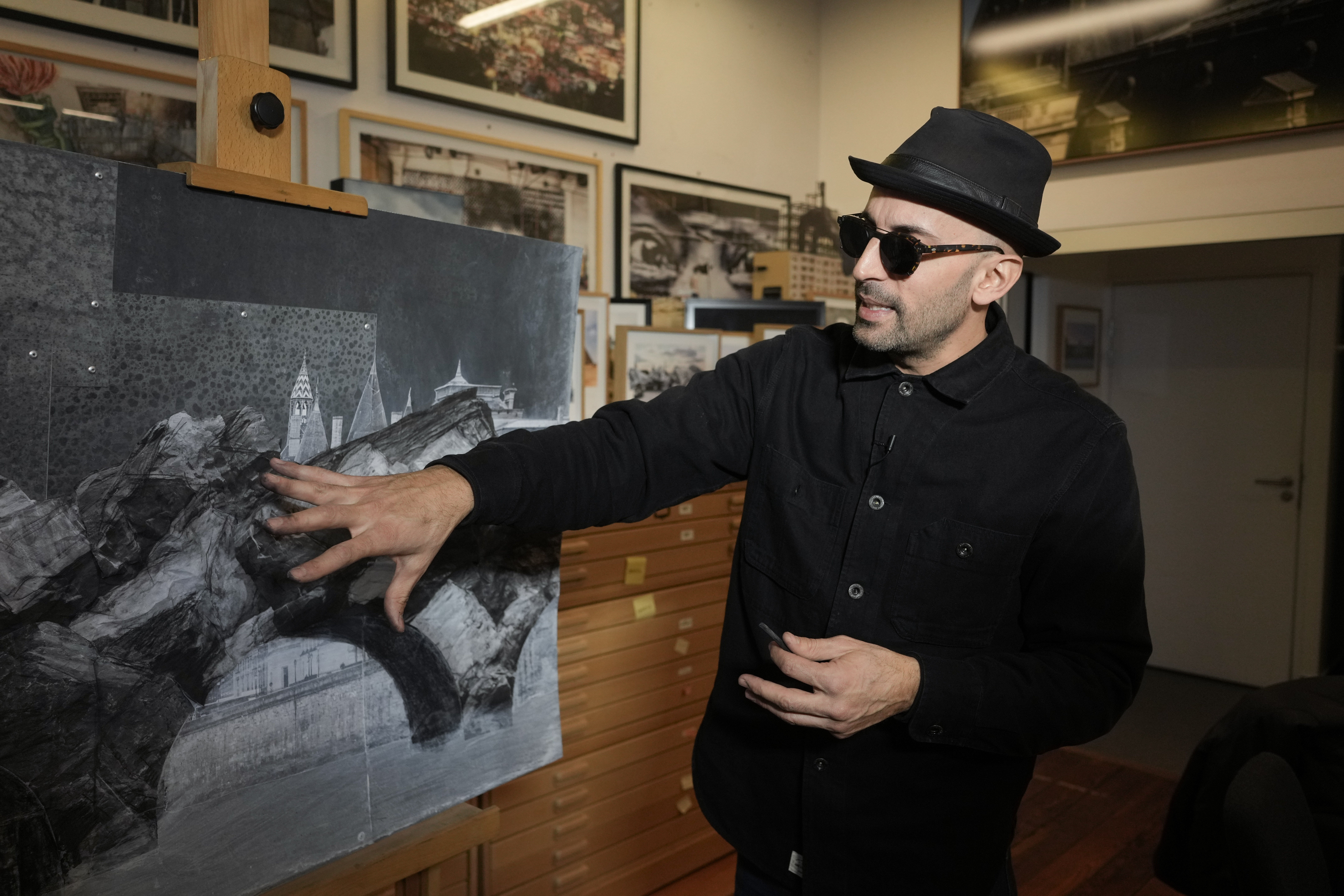 French artist JR shows his project Pont Neuf Cavern in his studio, in Paris, France