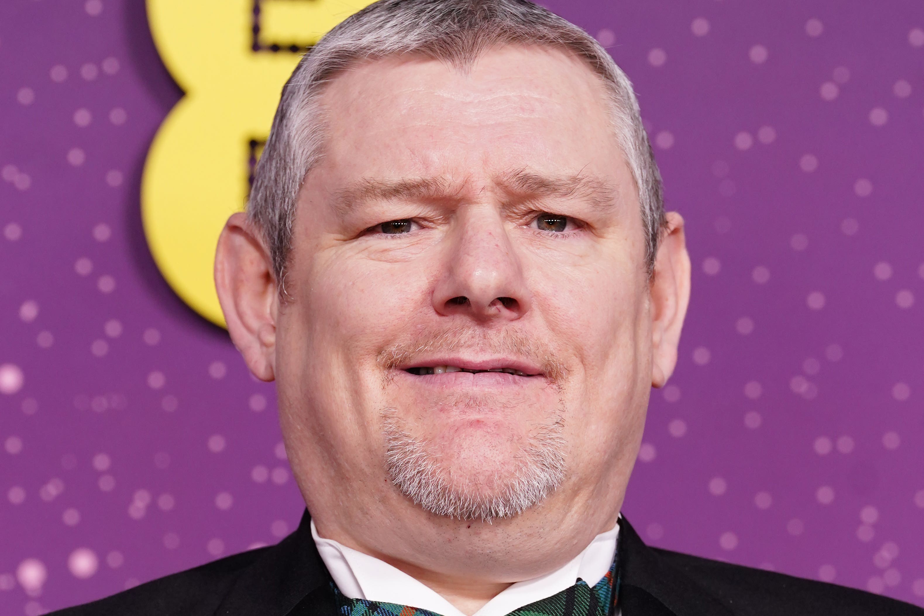 Џон Дејвидсон који је узвикивао увреде током церемоније (Иан Вест/ПА)