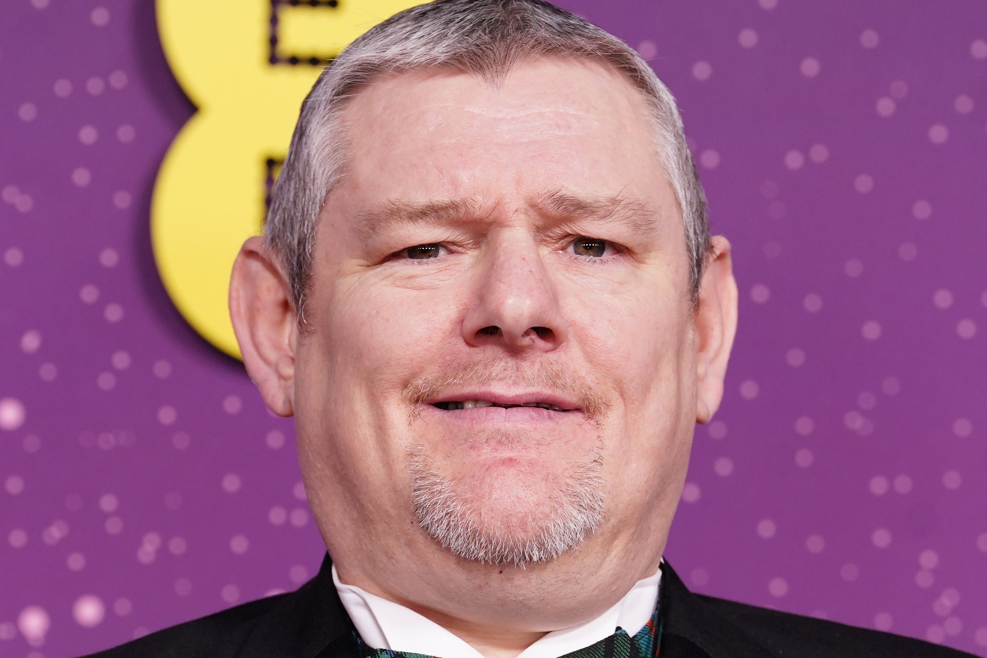 Џон Дејвидсон на Бафтасу (Иан Вест/ПА)