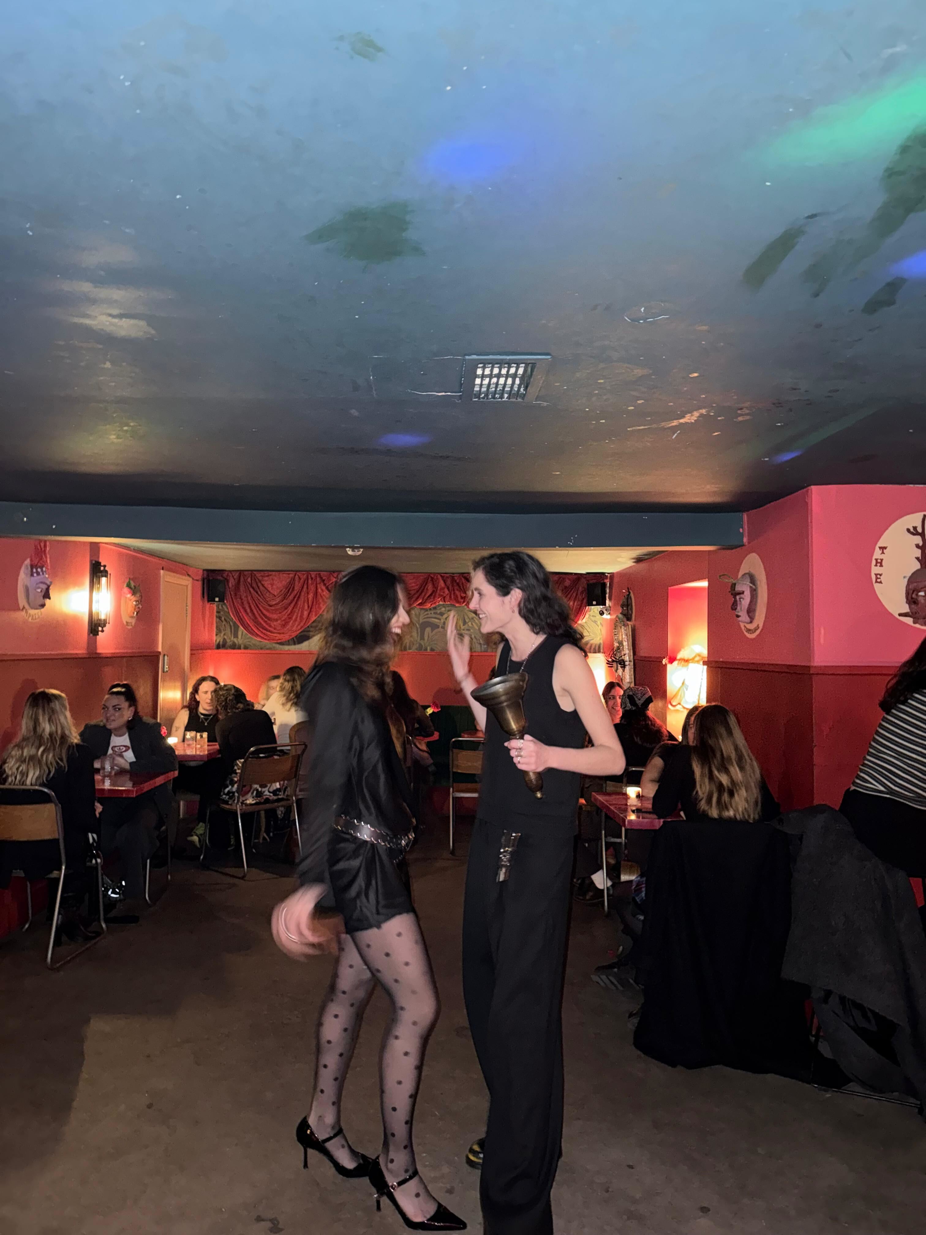 Men aren’t signing up to singles nights - I launched my own and found out why Olivia and a friend at the queer version of her dating event