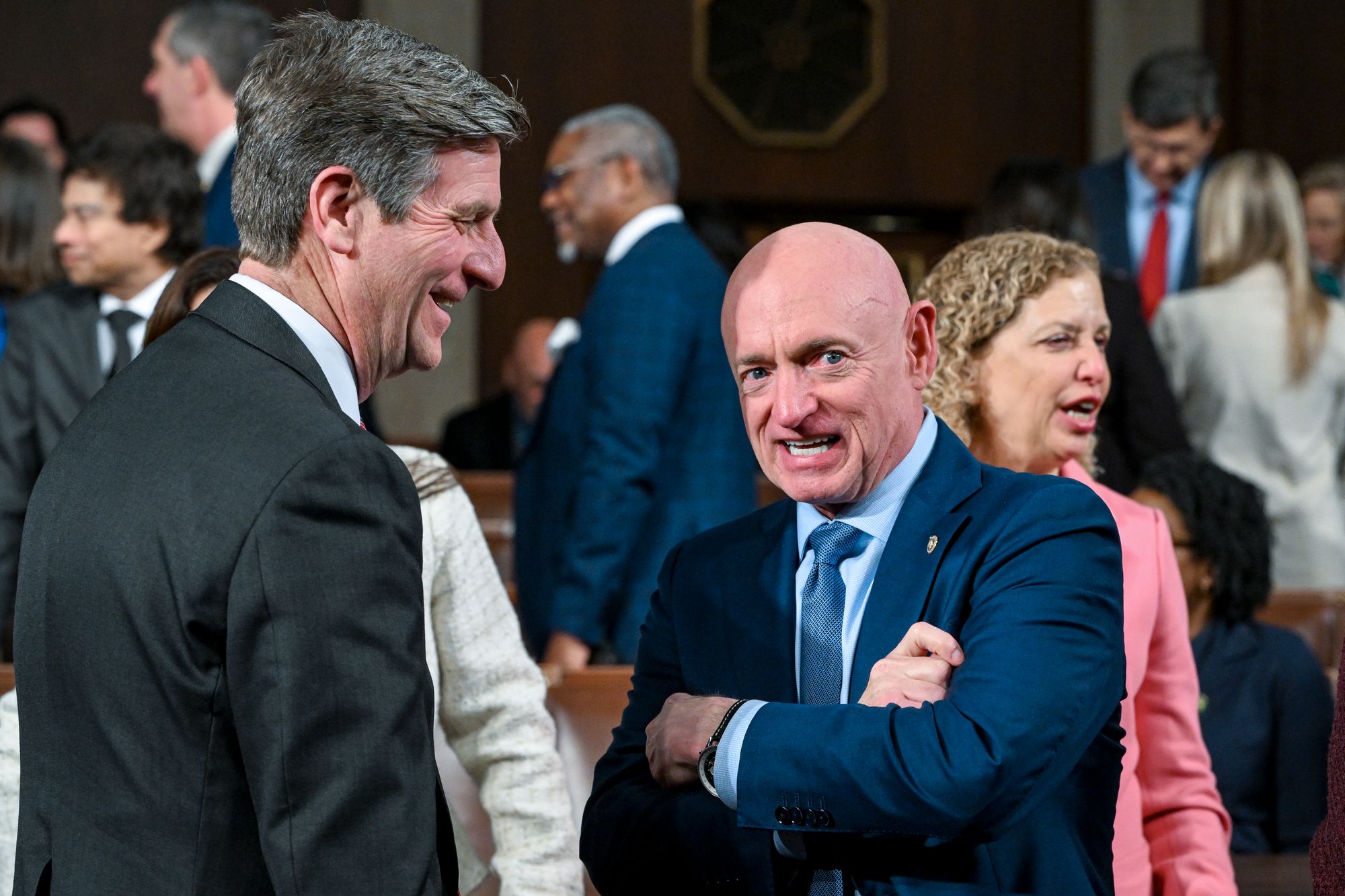 U.S. Sen. Mark Kelly (D-AZ) (R) attended the State of the Union despite the Pentagon under the Trump administration trying to lower his retirement rank and pay.