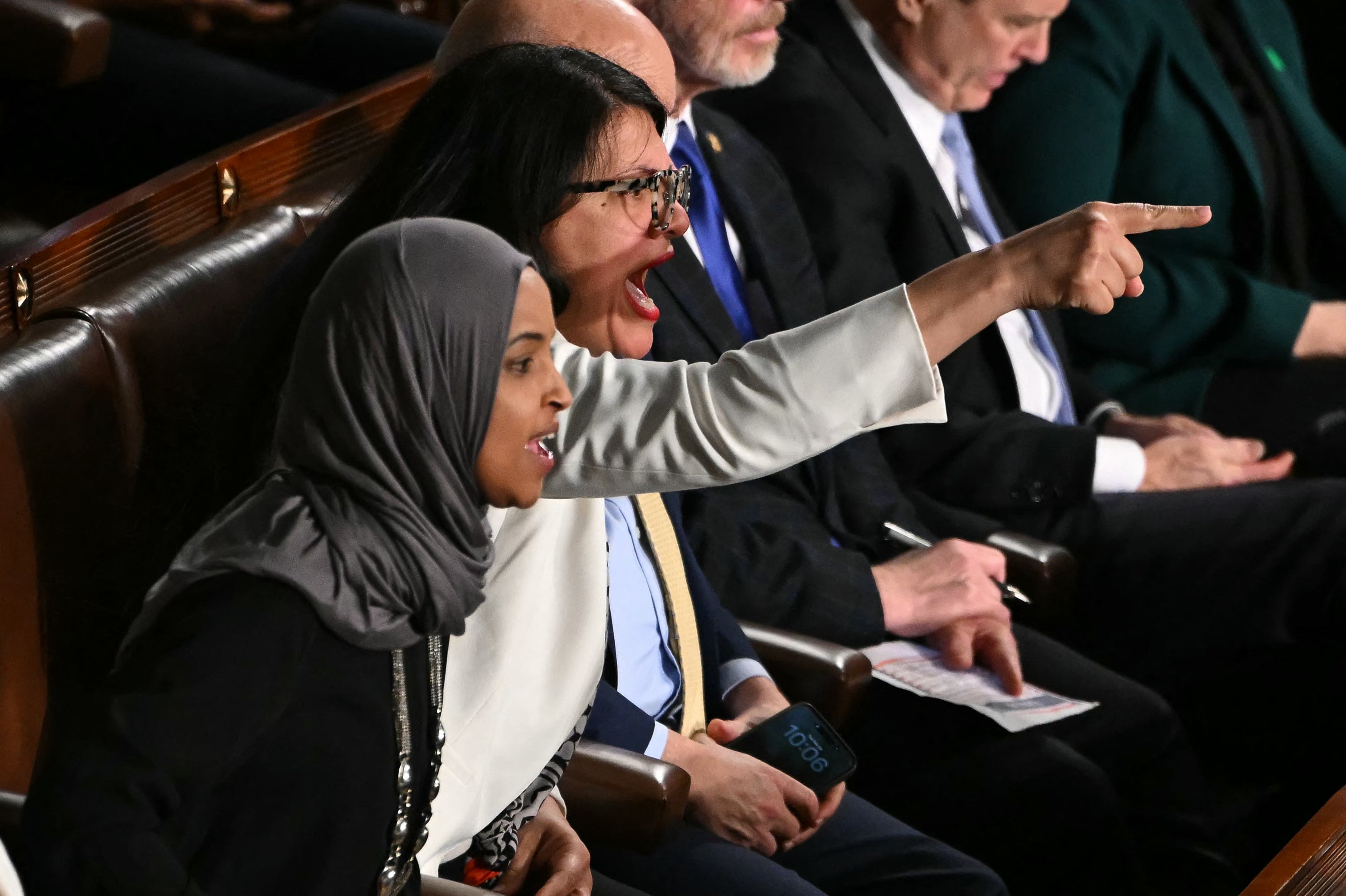 Congresswomen Ilhan Omar and Rashida Tlaib shouted as President Donald Trump spoke about his immigration crackdown during his State of the Union address