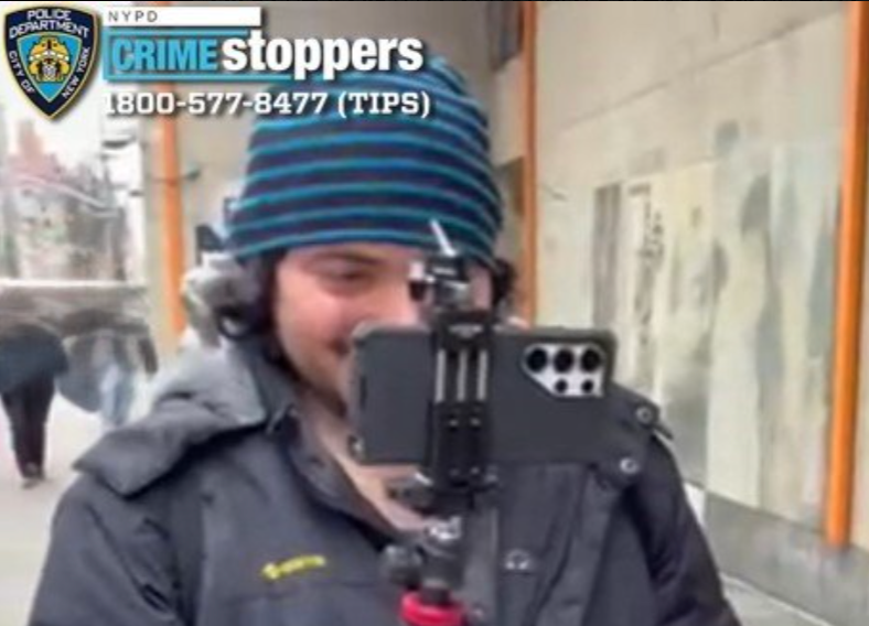 One of the men, Michael Santiago, filmed the encounter with a selfie stick, while the other continued to use a racist slur